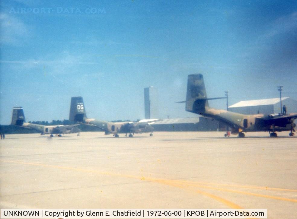 UNKNOWN, Miscellaneous Various C/N unknown, C-7 Caribous on Green Ramp, to be used by Special Forces or 82nd Airborne Division.  Taken with a Kodak X-15 while walking out to a C-130 to act as safety NCO for a jump.