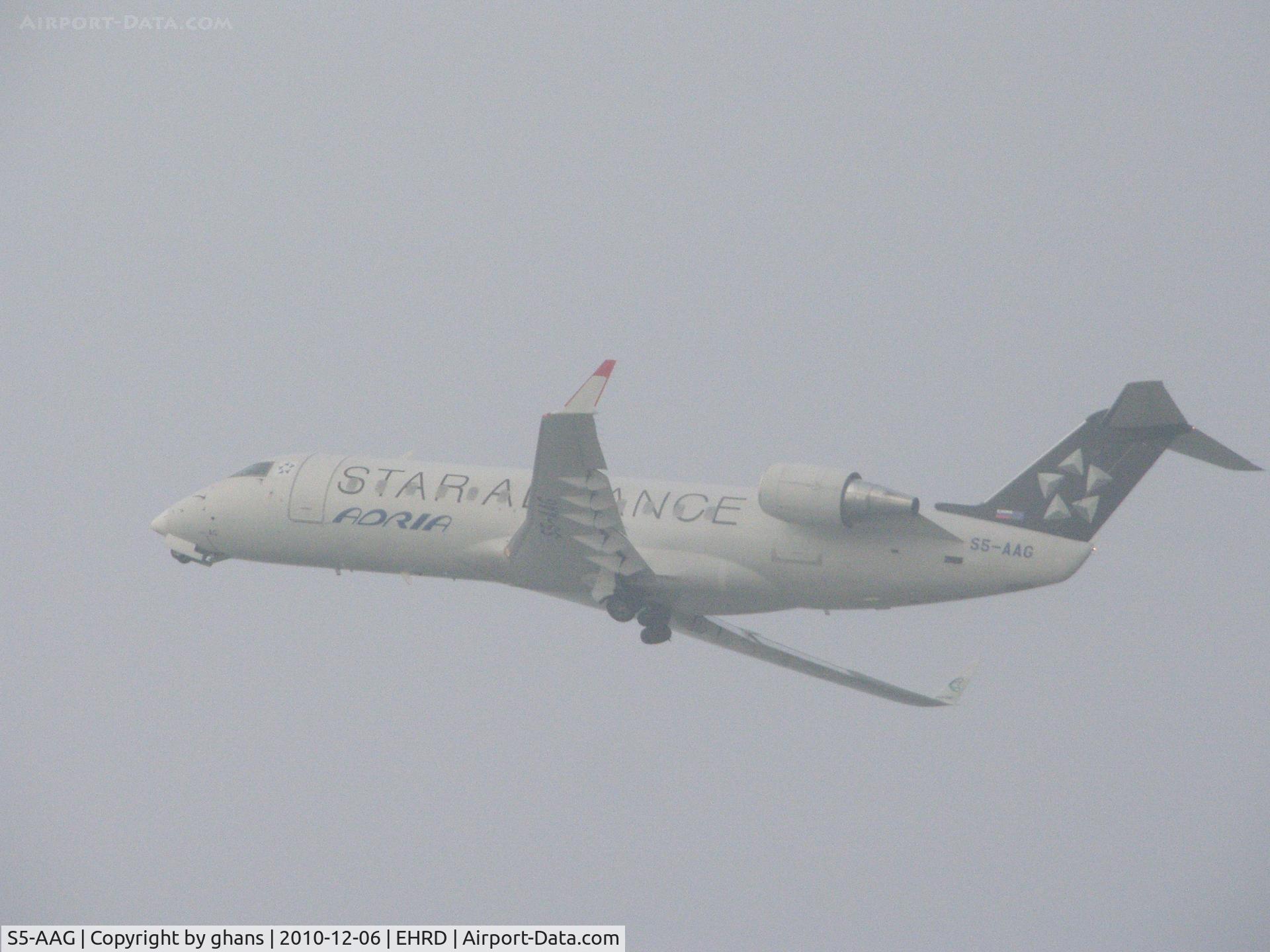 S5-AAG, 2000 Canadair CRJ-200LR (CL-600-2B19) C/N 7384, Foggy take-off