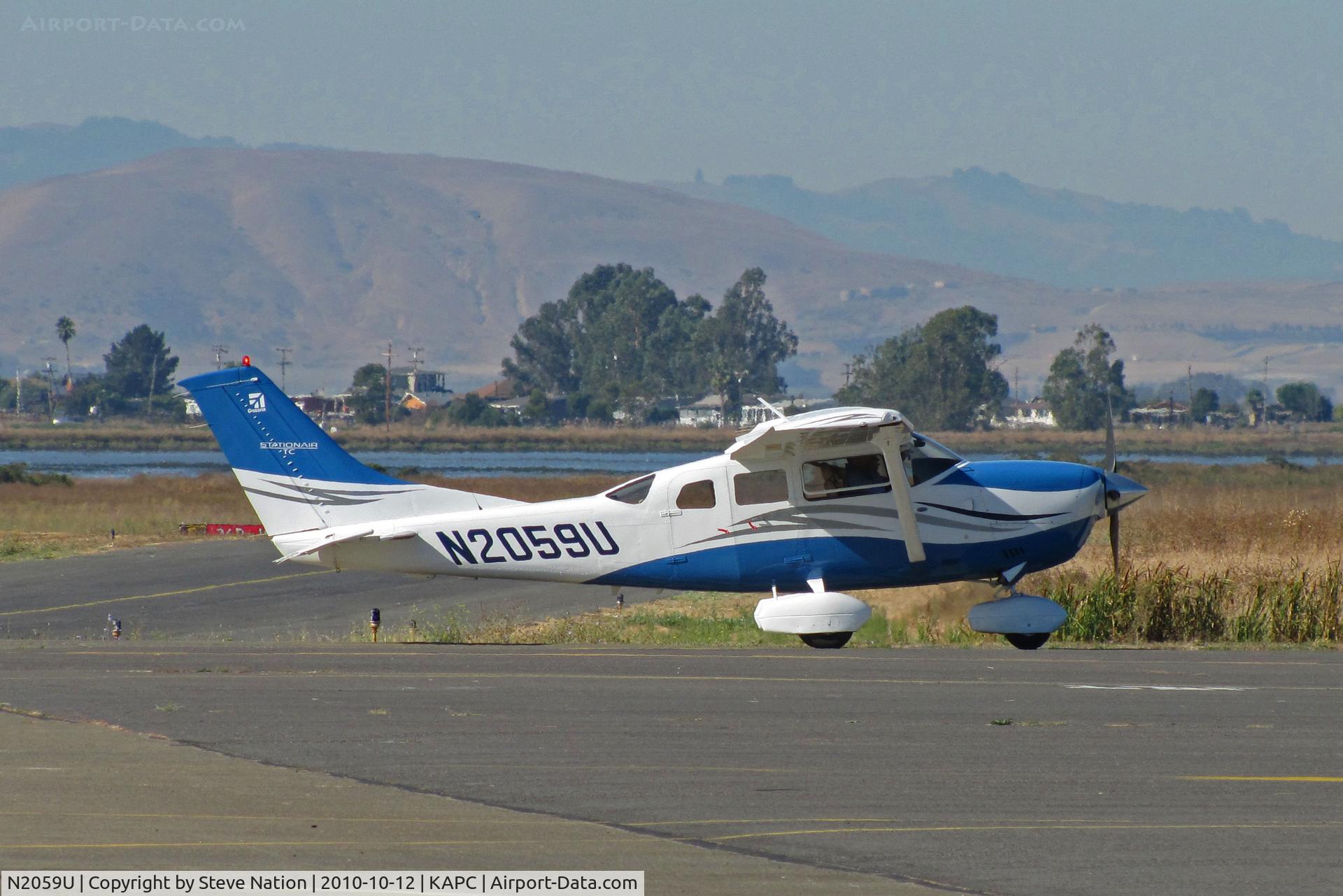 N2059U, 2006 Cessna T206H Turbo Stationair C/N T20608701, 2006 Cessna T206H visiting with Napa River in background @ Napa County Airport, CA