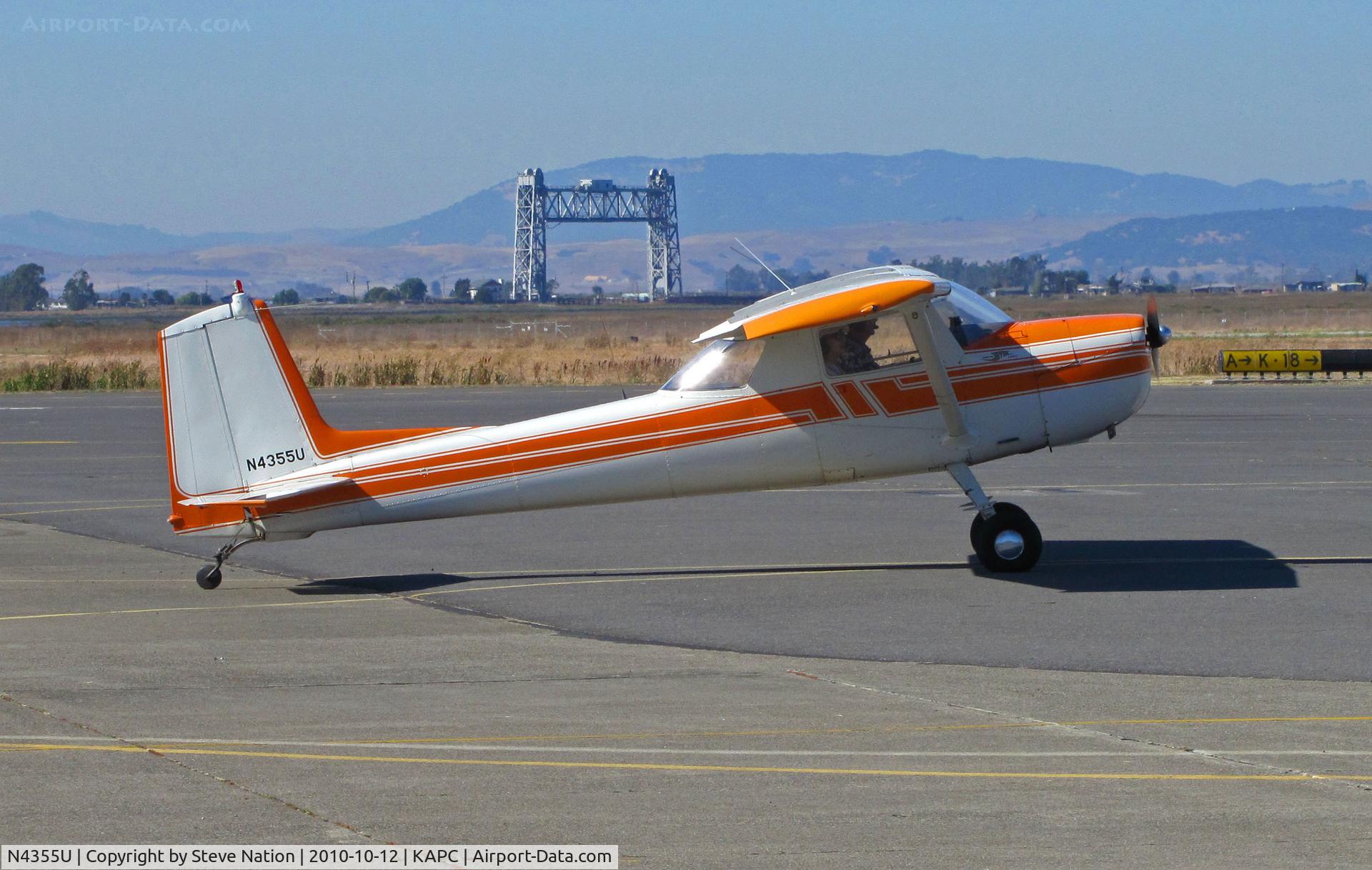 N4355U, 1964 Cessna 150D C/N 15060355, 1964 Cessna 150D tail wheel conversion arriving from KAUN/Auburn, CA with Napa River RR Bridge in background @ Napa County Airport, CA