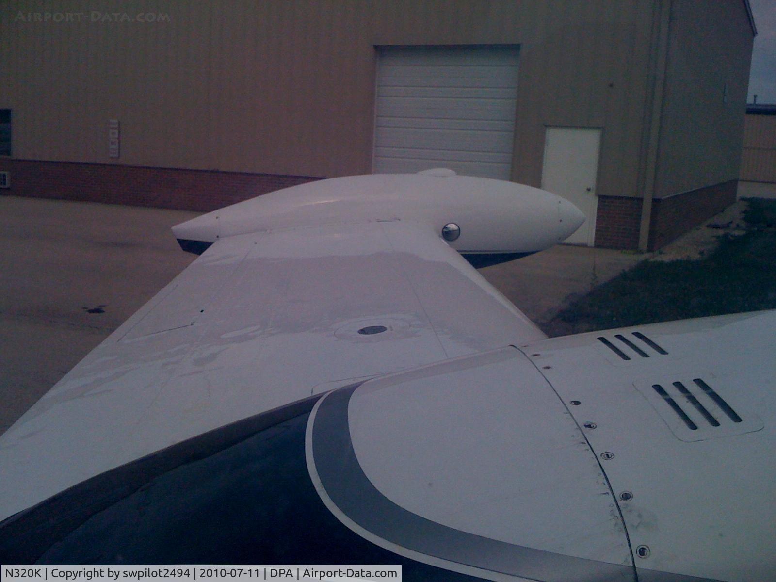 N320K, 1961 Cessna 320 Skyknight C/N 320-0018, Left wing