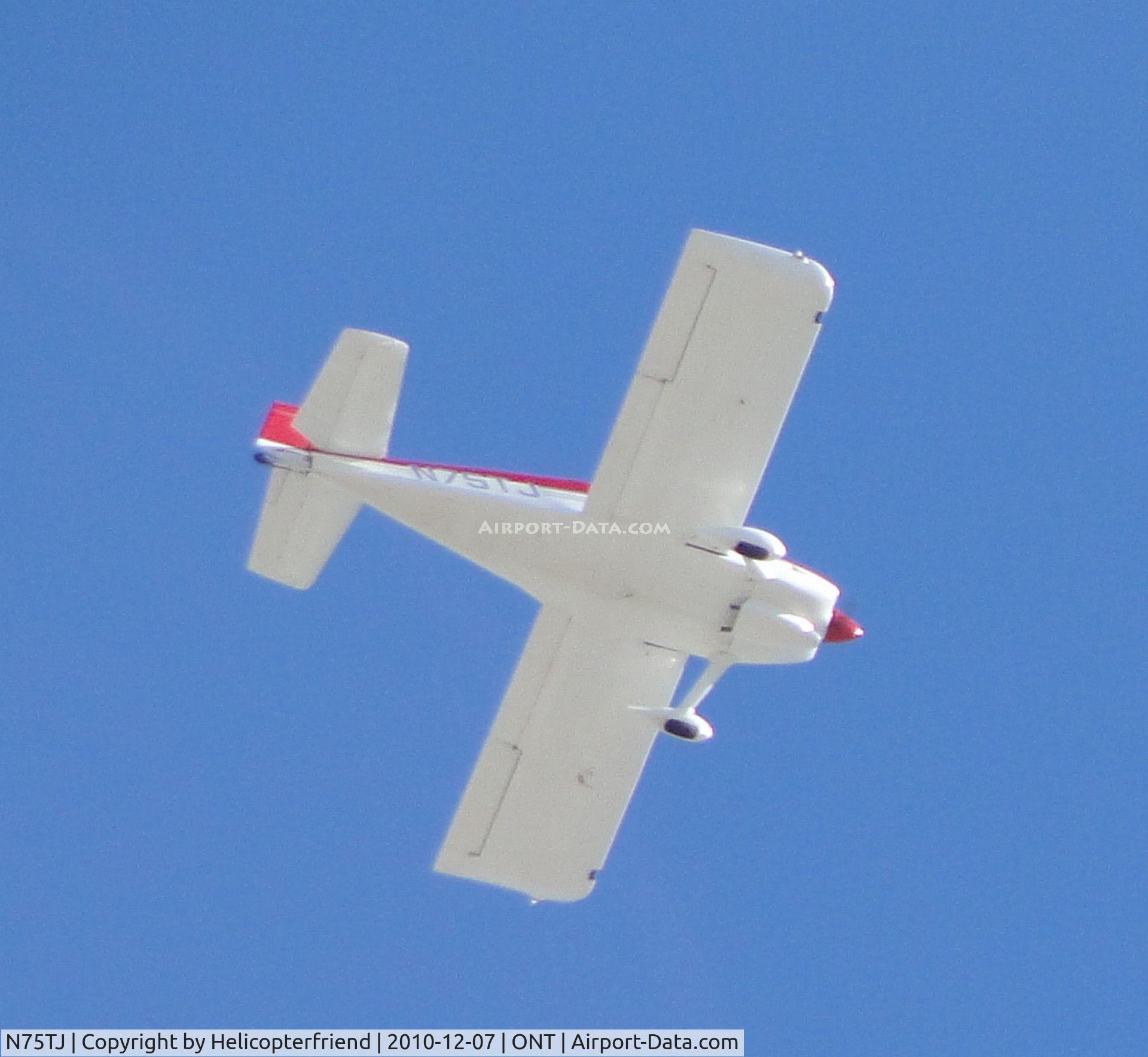 N75TJ, 2003 Vans RV-6 C/N 22633, Crossing active runways heading south east after tower clearence for 2500 feet