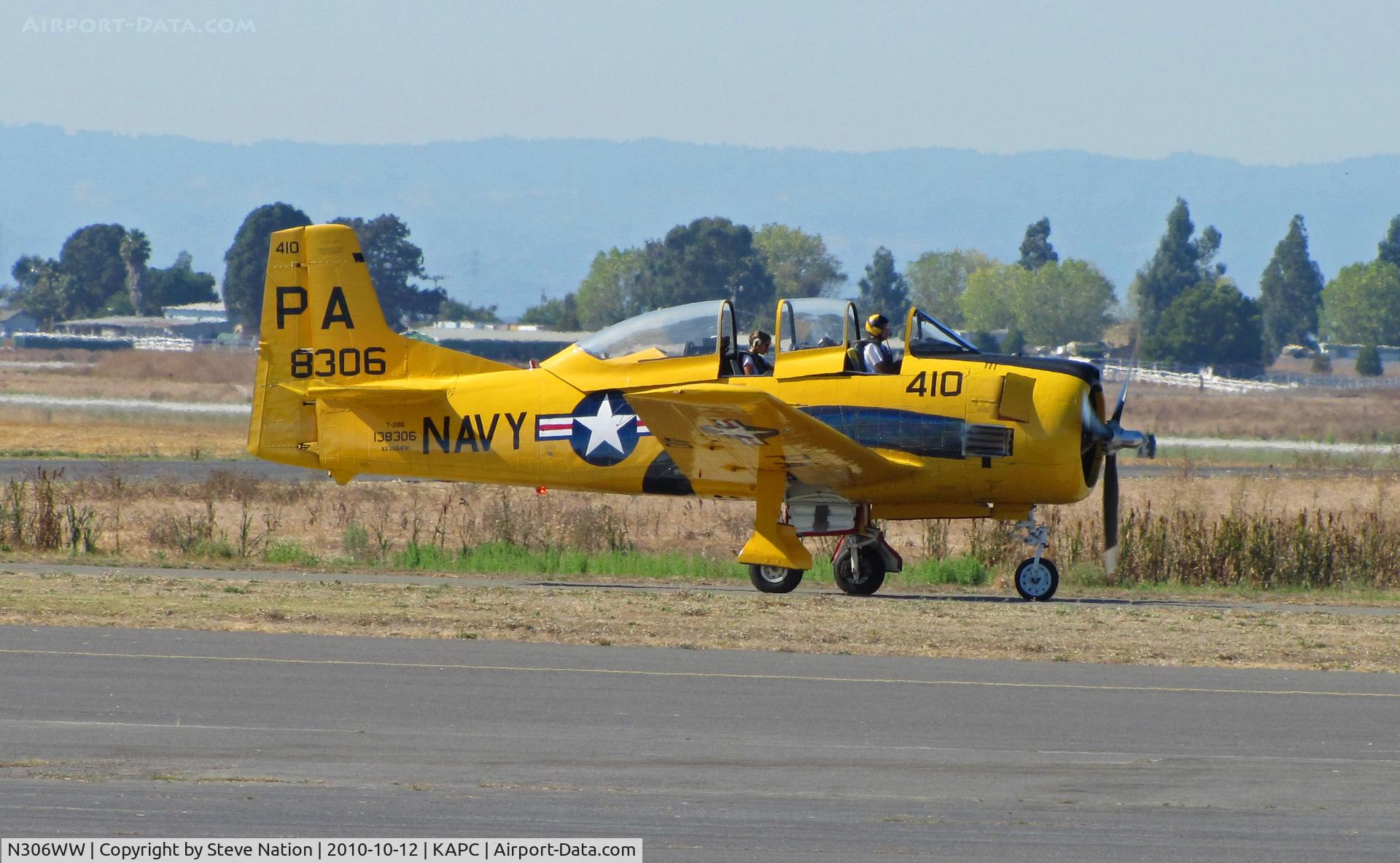 N306WW, 1955 North American T-28B Trojan C/N 200-377, 1955 T-28B BuAer 138306 in yellow US Navy training scheme marked as PA-410 and NX306WW taxis for take-off at Napa County Airport, CA home base