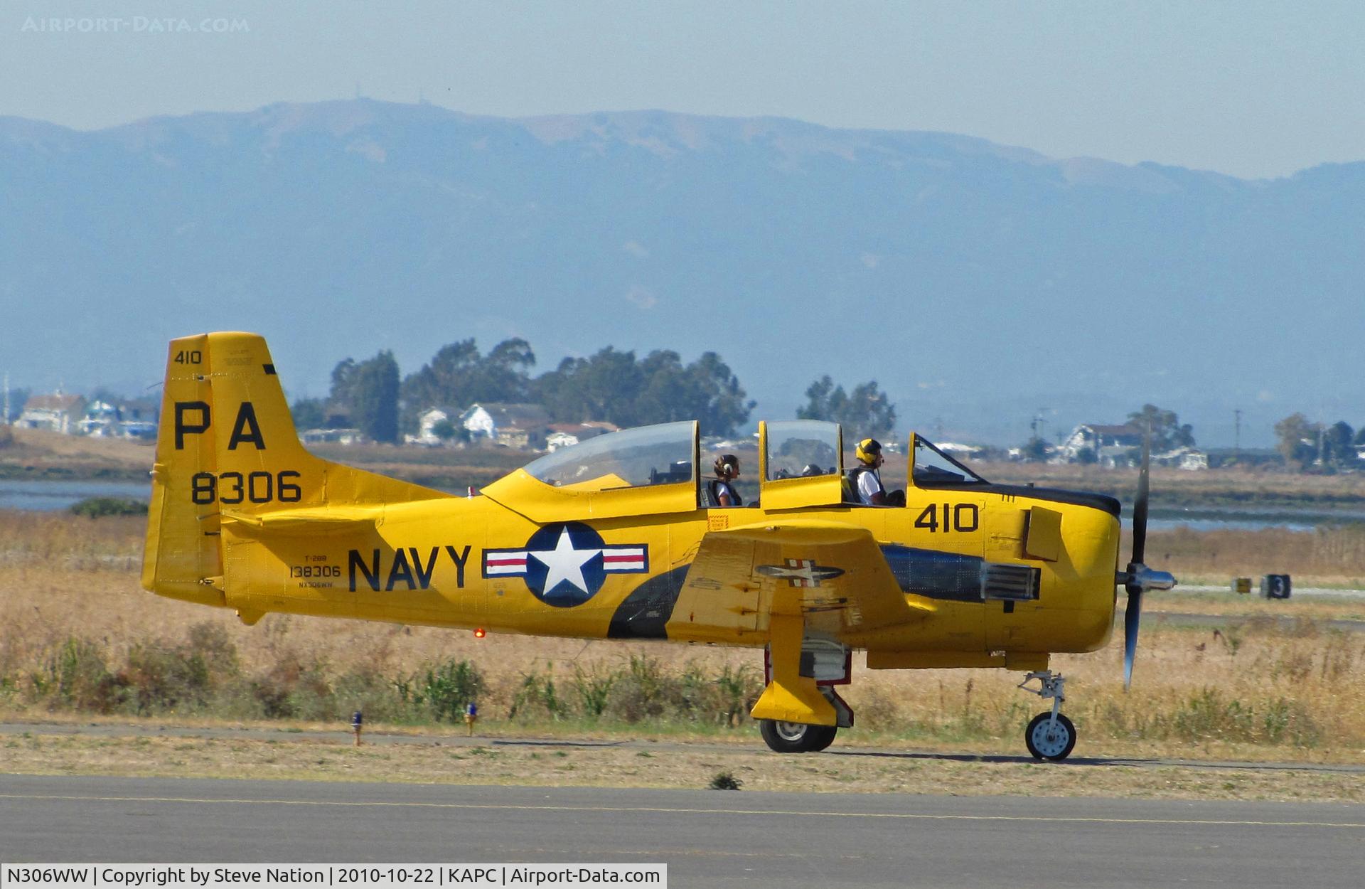 N306WW, 1955 North American T-28B Trojan C/N 200-377, 1955 T-28B BuAer 138306 in yellow US Navy training scheme marked as PA-410 and NX306WW taxis for take-off at Napa County Airport, CA home base