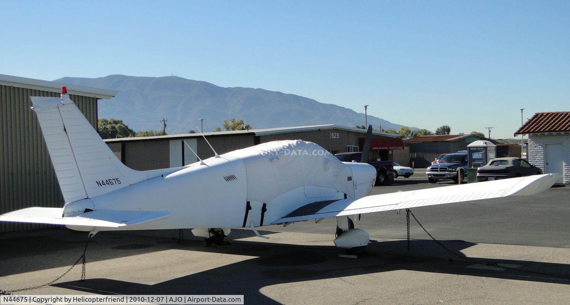 N44675, 1974 Piper PA-28-140 C/N 28-7425438, Covered and parked