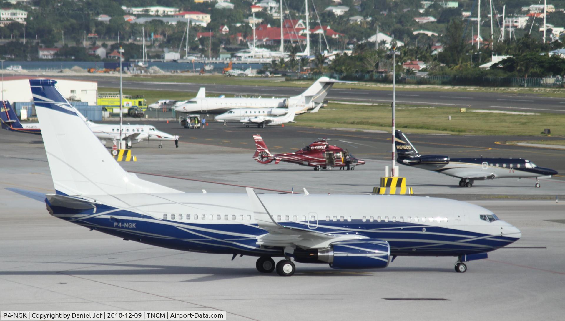 P4-NGK, 2010 Boeing 737-7HZ C/N 37583, P4-NGK taxing to parking on the main ramp at TNCM