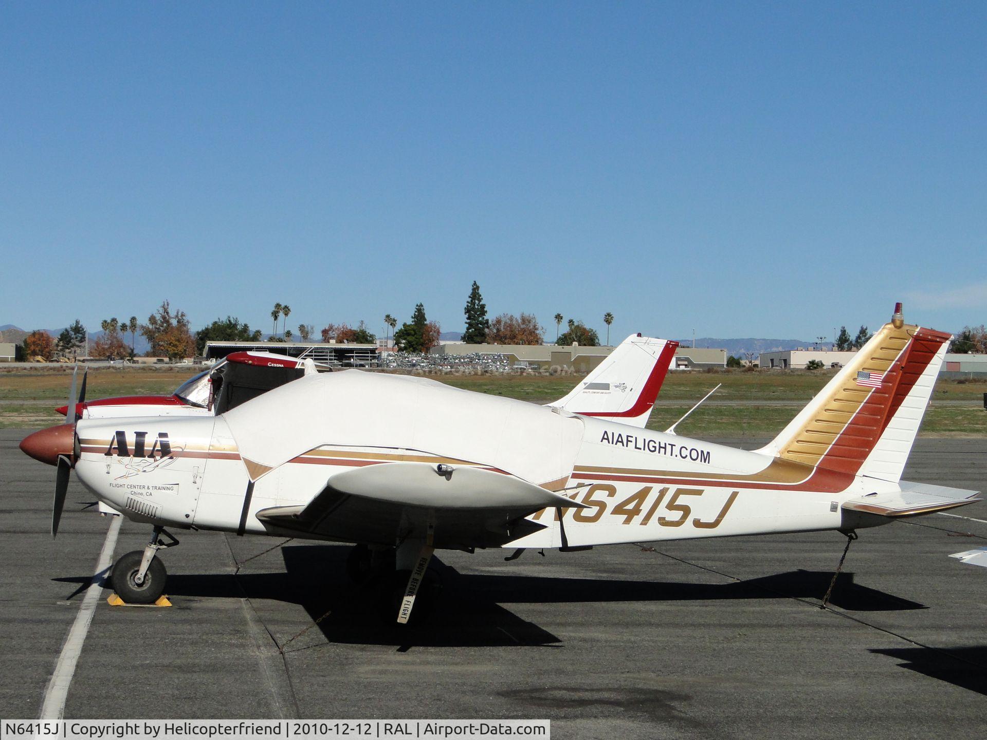 N6415J, 1968 Piper PA-28-180 C/N 28-4832, AIA ship covered up, tied down and parked by Admin Building