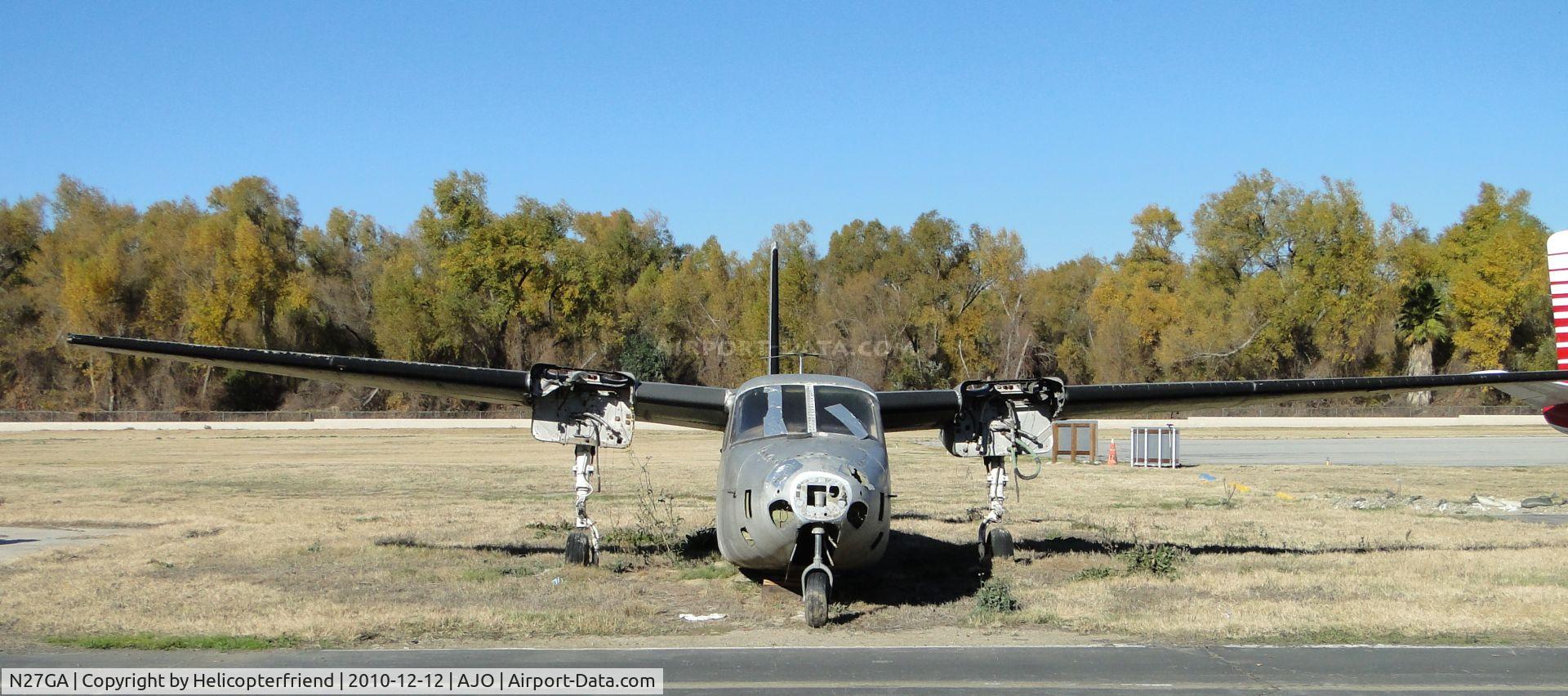 N27GA, 1962 Aero Commander 680-F C/N 680F-1212-111, Stripped down and parked in the grass near the runway
