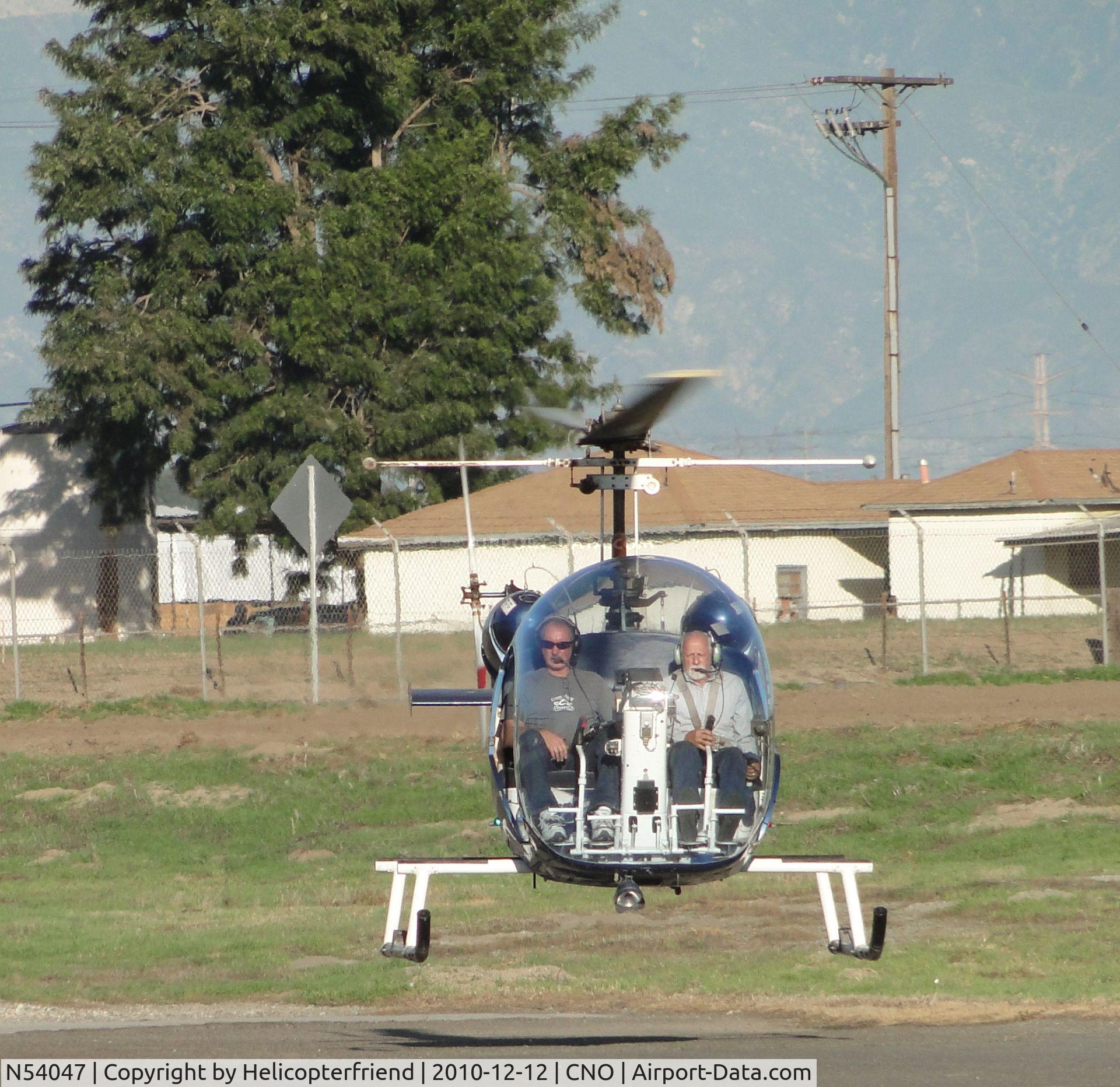N54047, 1967 Bell 47G C/N 002, Hovering awaiting permission to take off westbound