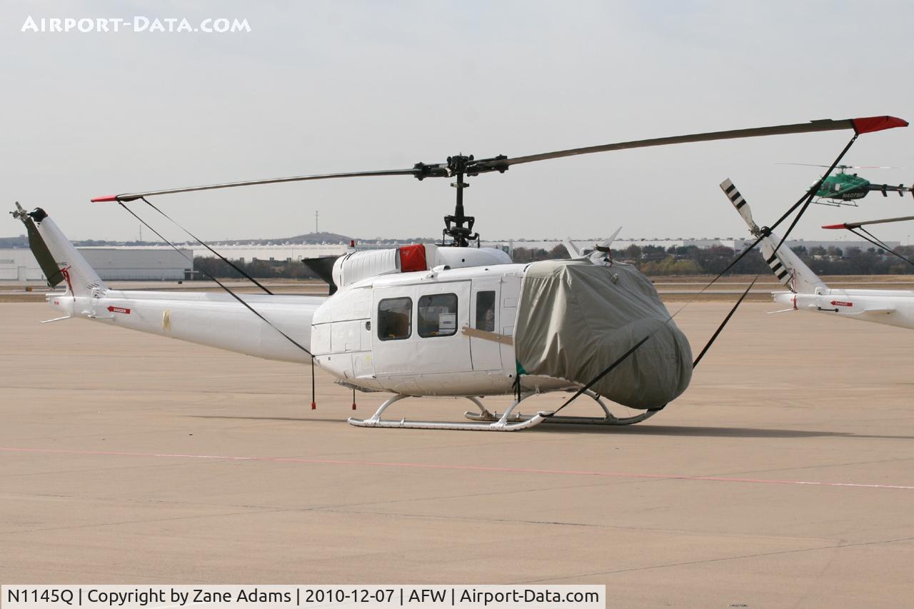 N1145Q, Bell UH-1H Iroquois C/N 8549, One of six Dyncorp UH-1H's on the ramp at Alliance Airport - Fort Worth, TX ( These aircraft may be for use in Iraq)