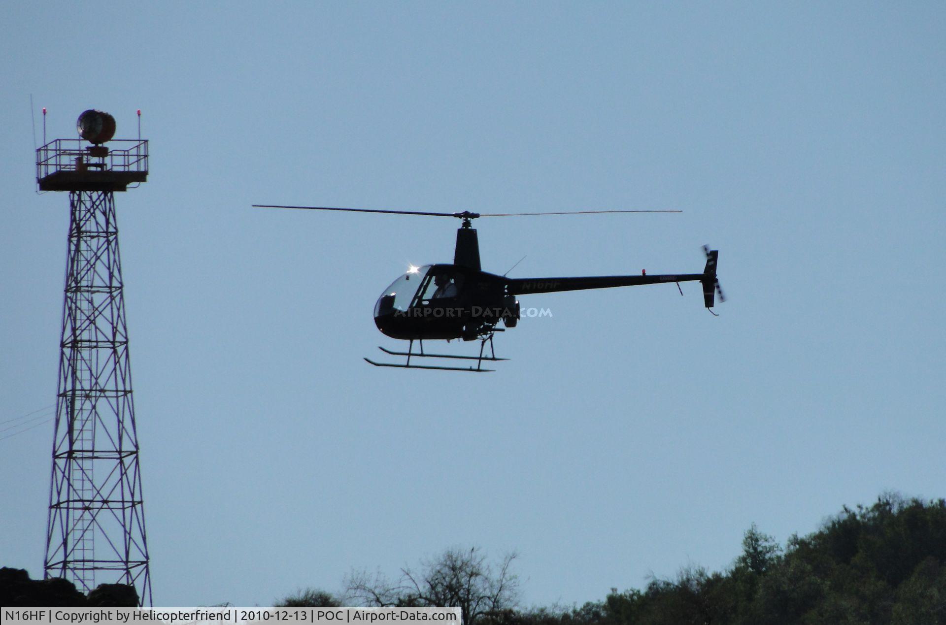 N16HF, 1988 Robinson R22 BETA C/N 0778, Air taxiing along taxiway Sierra eastbound heading to helipads on the eastside
