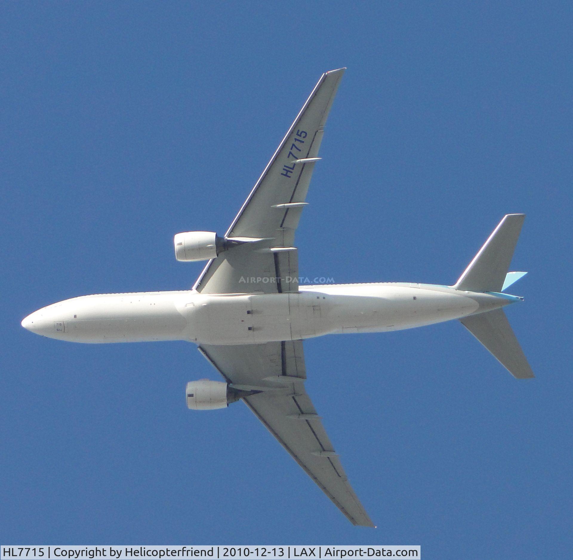 HL7715, 2002 Boeing 777-2B5/ER C/N 28372, On Final to runway 24 flying over the City of Bell, Califonia, approximately 15 miles east of LAX