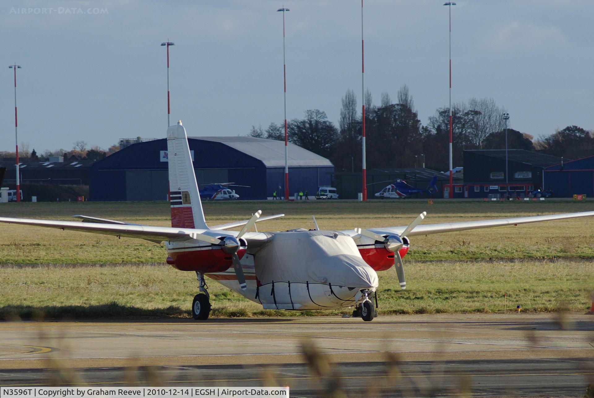 N3596T, 1959 Aero Commander 500 C/N 752, Parked out in the cold at Norwich.