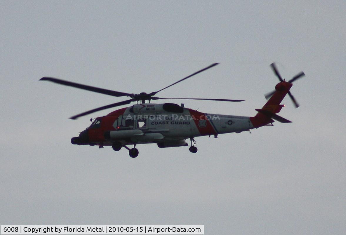 6008, Sikorsky MH-60J Jayhawk C/N 70.1565, Coast Guard MH-60J flying along Passe A Grille Beach by St. Pete before dark
