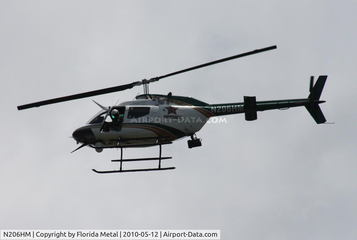 N206HM, 1970 Bell OH-58C Kiowa C/N 40985, Orange County Sheriff OH-58C.  Circling over my apartment complex after a bank robbery down the street in Orlando
