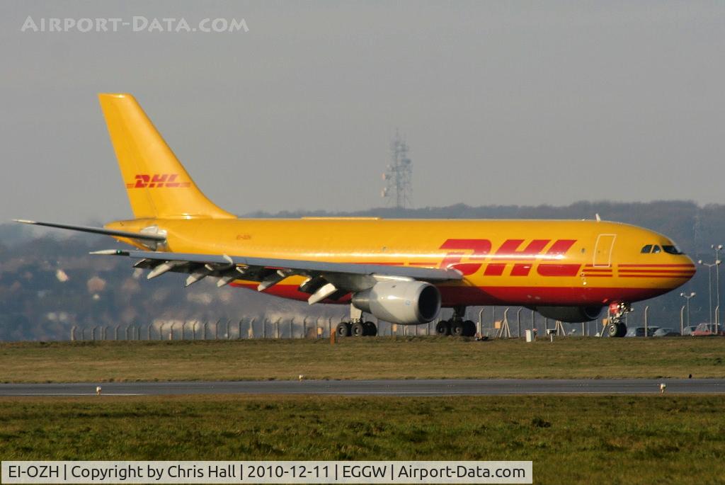 EI-OZH, 1982 Airbus A300B4-203(F) C/N 234, DHL A300 taxying to the cargo apron after arriving on RW26