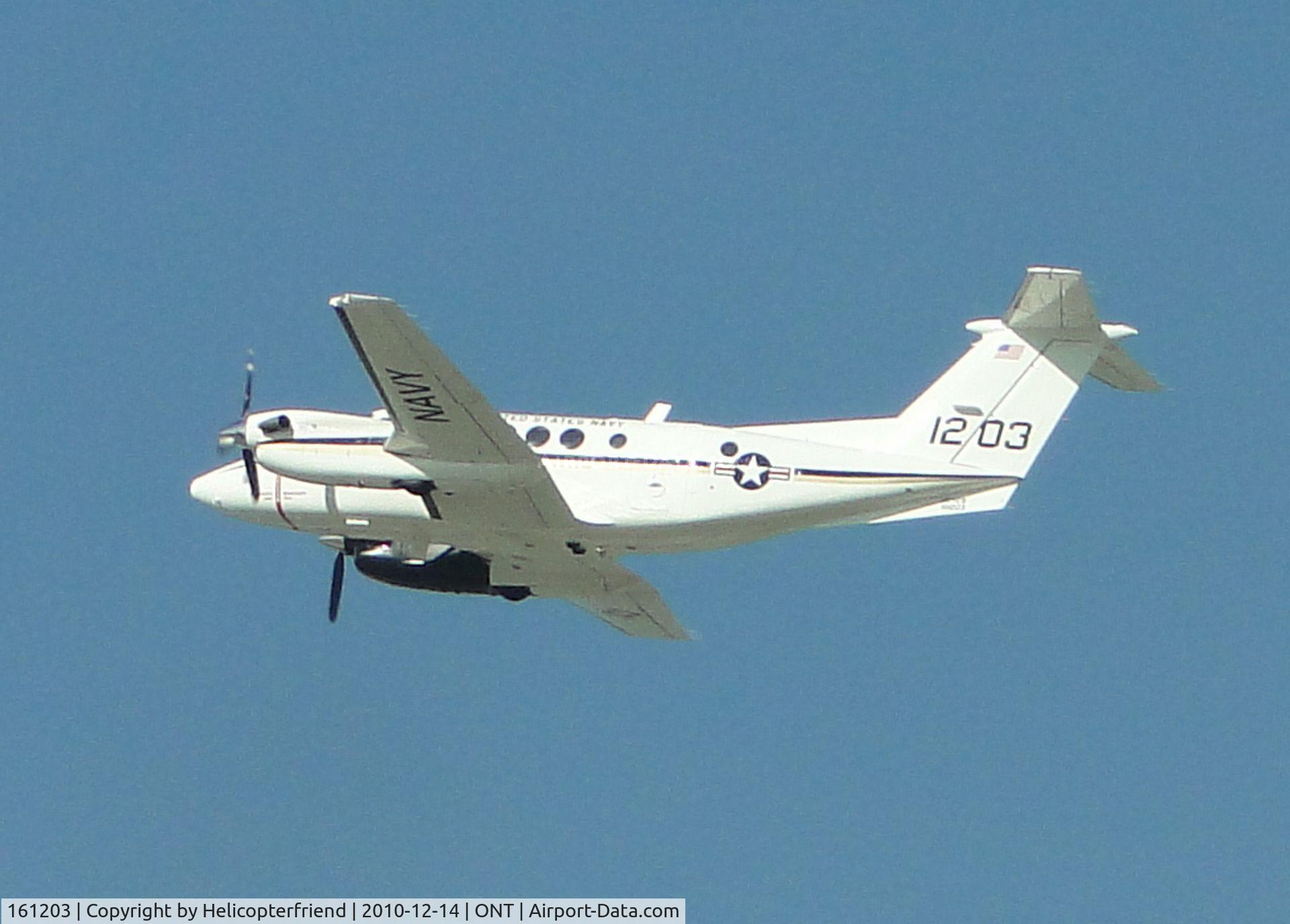 161203, Beech UC-12B Huron C/N BJ-19, Flying westbound from Ontario, notice black engine