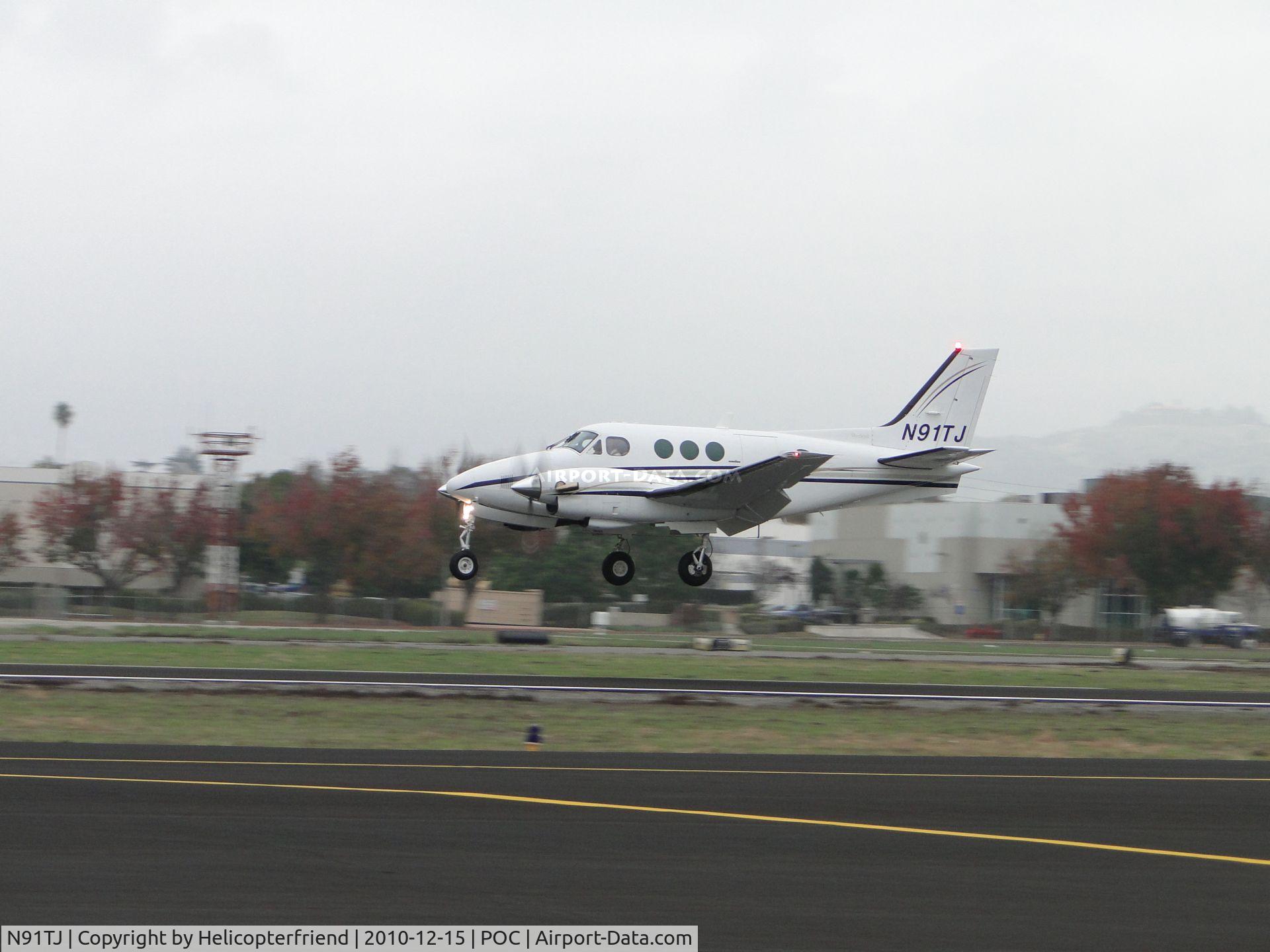 N91TJ, 1978 Beech C90 C/N LJ-744, Landing deep and smoothly on runway 26L before reversing props