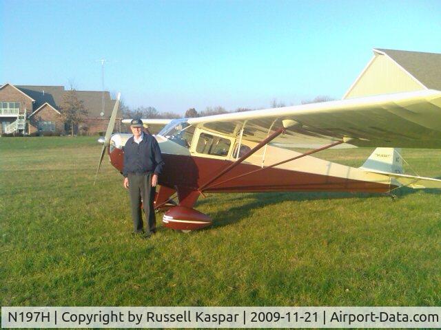 N197H, 1941 Taylorcraft BC-12-65 C/N 2915, Russ Kaspar took this picture of 197H and Jim Ellis.  Jim spent 12 years restoring this aircraft to near perfection.