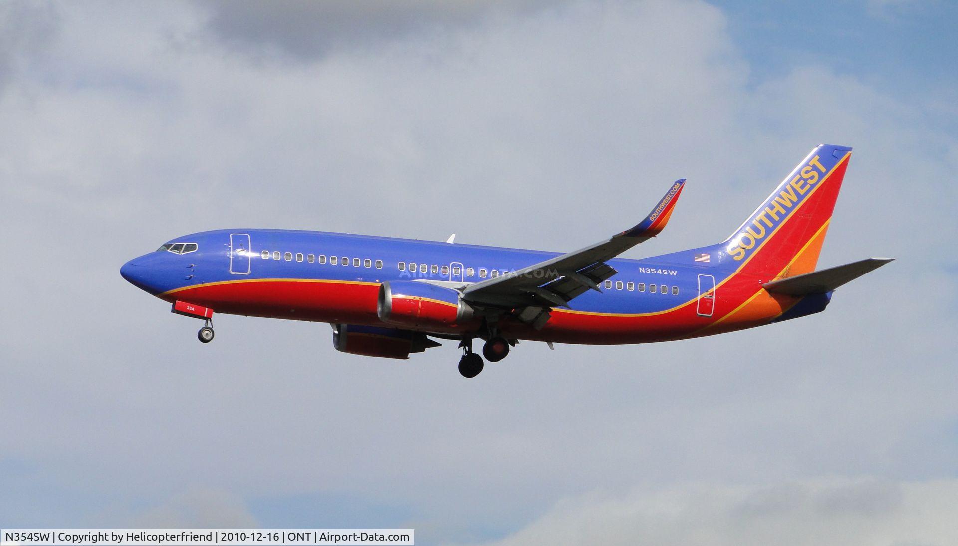 N354SW, 1991 Boeing 737-3H4 C/N 25219, On final to runway 26R