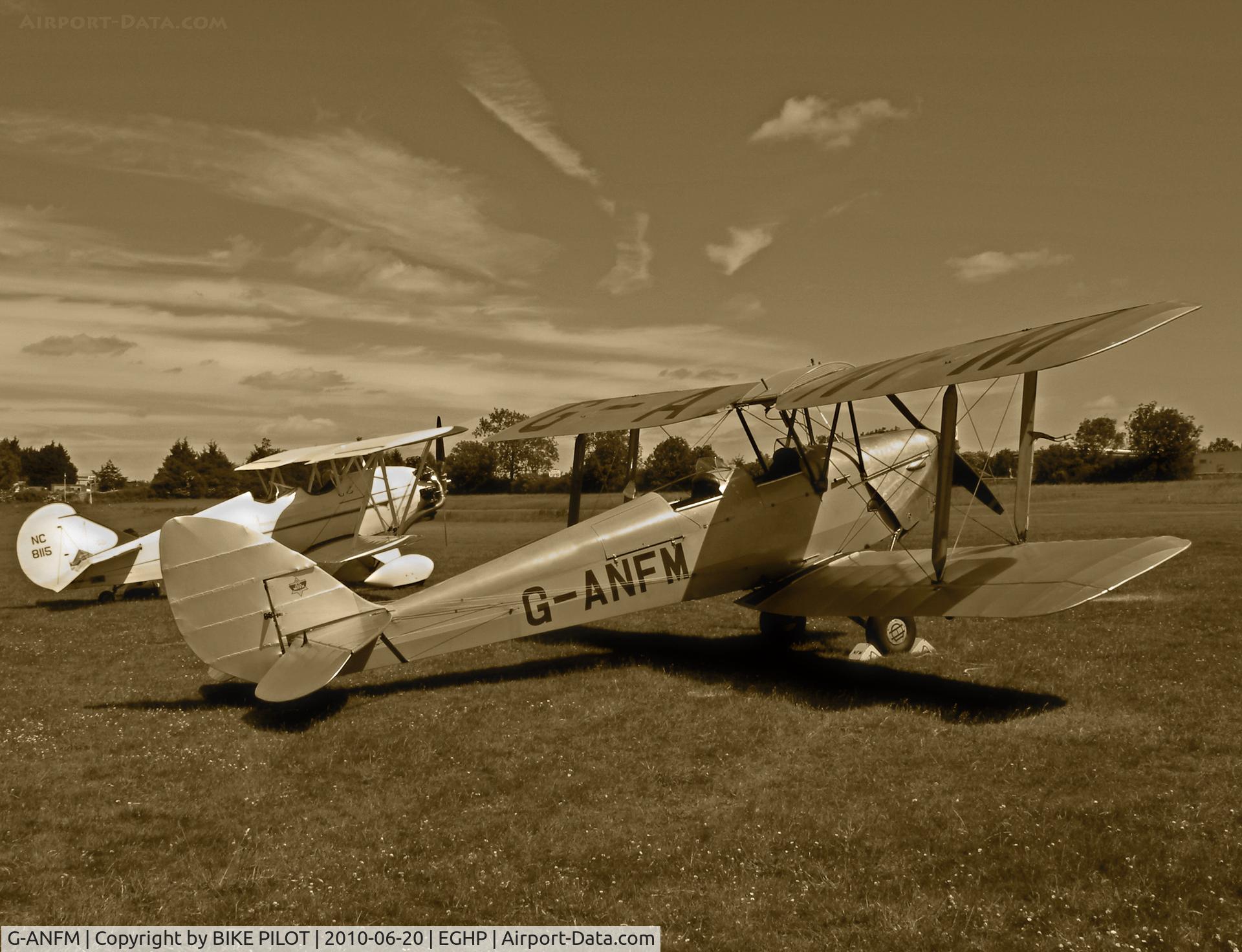 G-ANFM, 1941 De Havilland DH-82A Tiger Moth II C/N 83604, DH82A Tiger Moth with Travel Air D-4000 N8115 behind