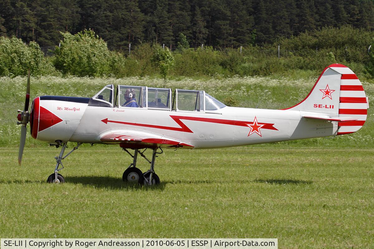 SE-LII, 1986 Bacau Yak-52 C/N 867015, At EAA FlyIn