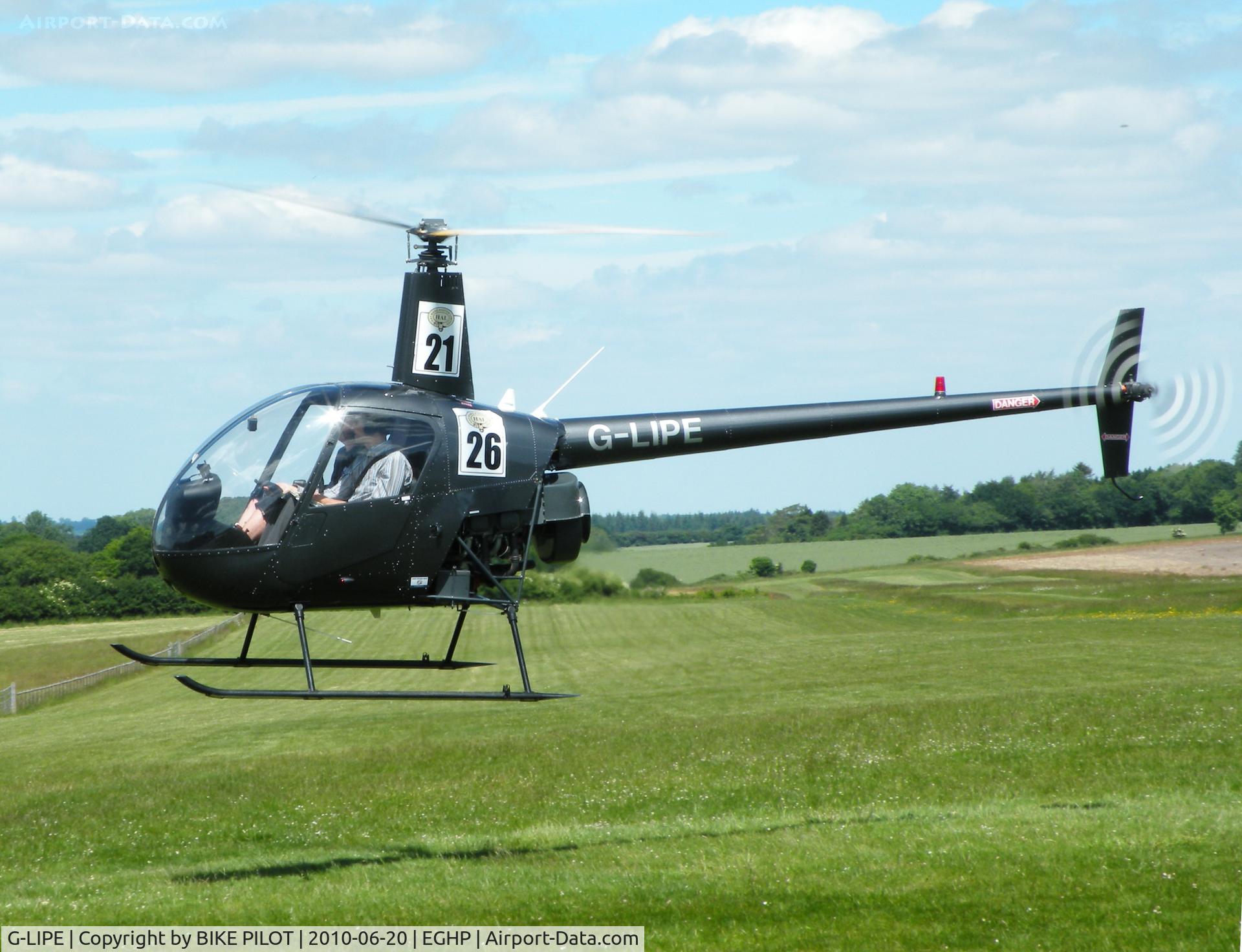 G-LIPE, 1991 Robinson R22 Beta C/N 1882, Manouvering to land
