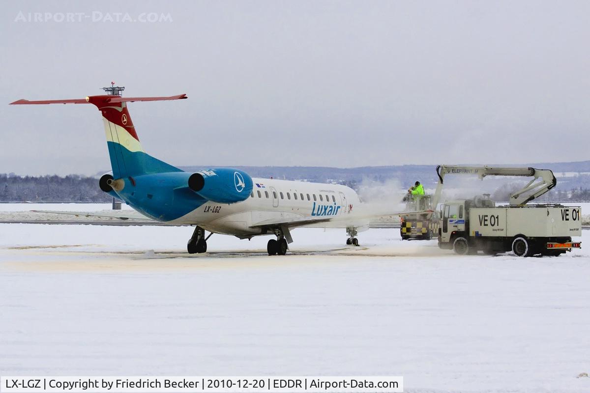 LX-LGZ, 2000 Embraer EMB-145LU (ERJ-145LU) C/N 145258, de-icing prior departure