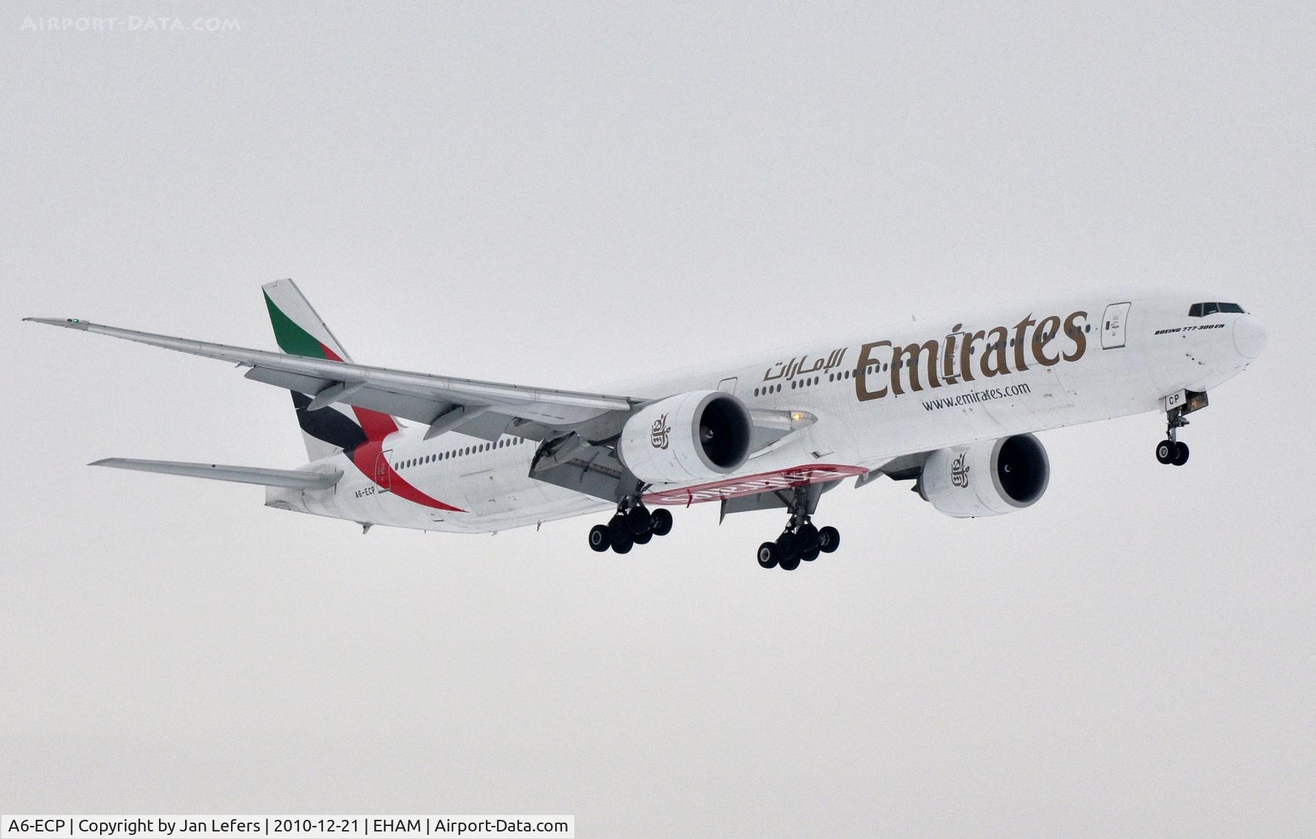 A6-ECP, 2009 Boeing 777-36N/ER C/N 37707, Emirates 777 landing on 36R out of the Fog