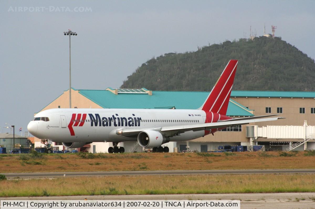 PH-MCI, 1991 Boeing 767-31A C/N 25312, Martin Air's inaugural flight to Aruba. Notice the Hooiberg hill in the background