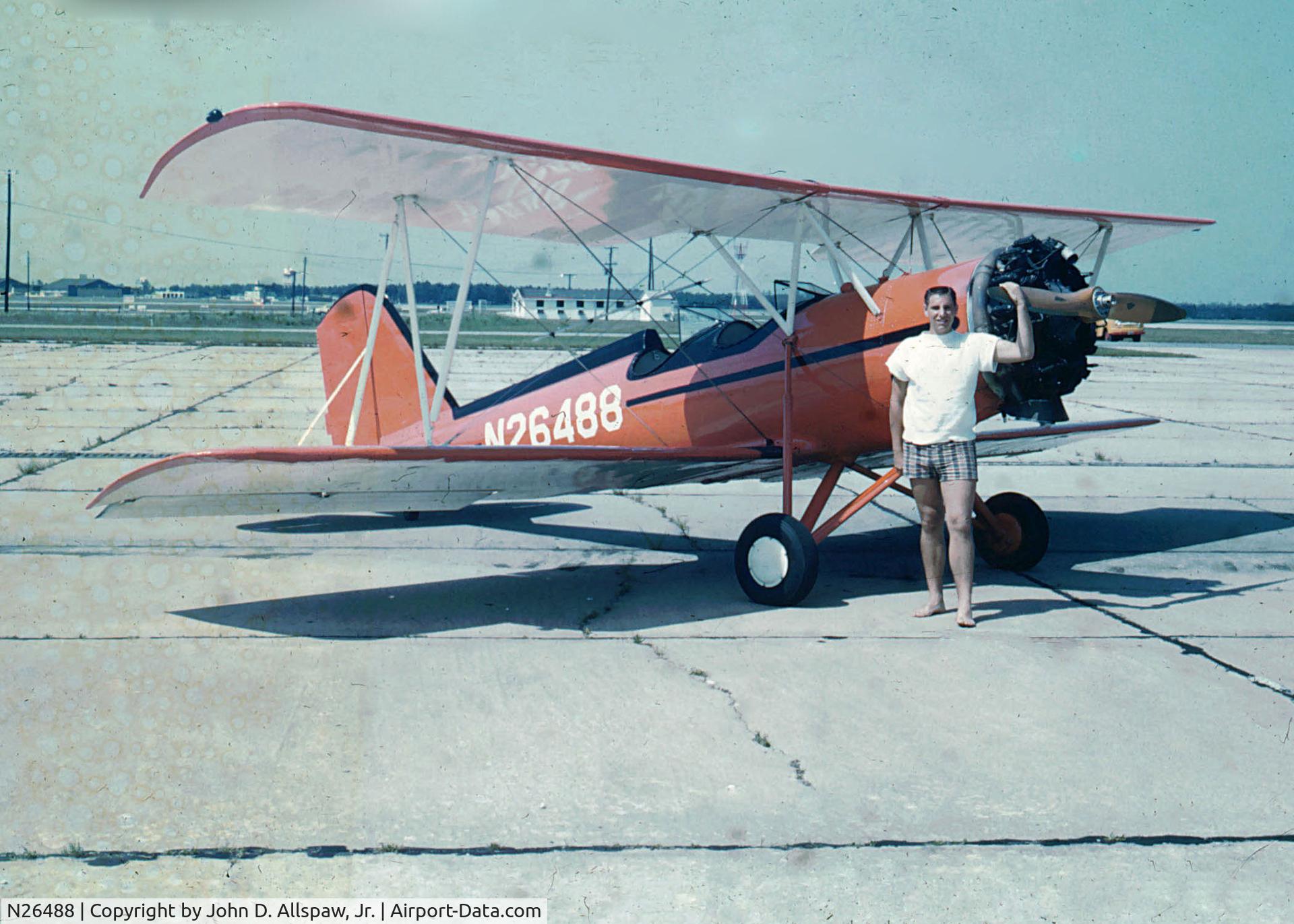 N26488, 1941 Meyers OTW-160 C/N 41, I spotted this plane sitting on the ramp at Myrtle Beach AFB, South Carolina while I was stationed there in 1962. Person in photo unknown
