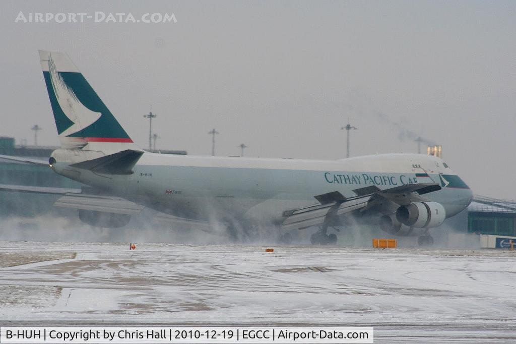 B-HUH, 1994 Boeing 747-467F/SCD C/N 27175, Cathy Pacific B747 kicking up the snow with full reverse thrust while landing on RW05L
