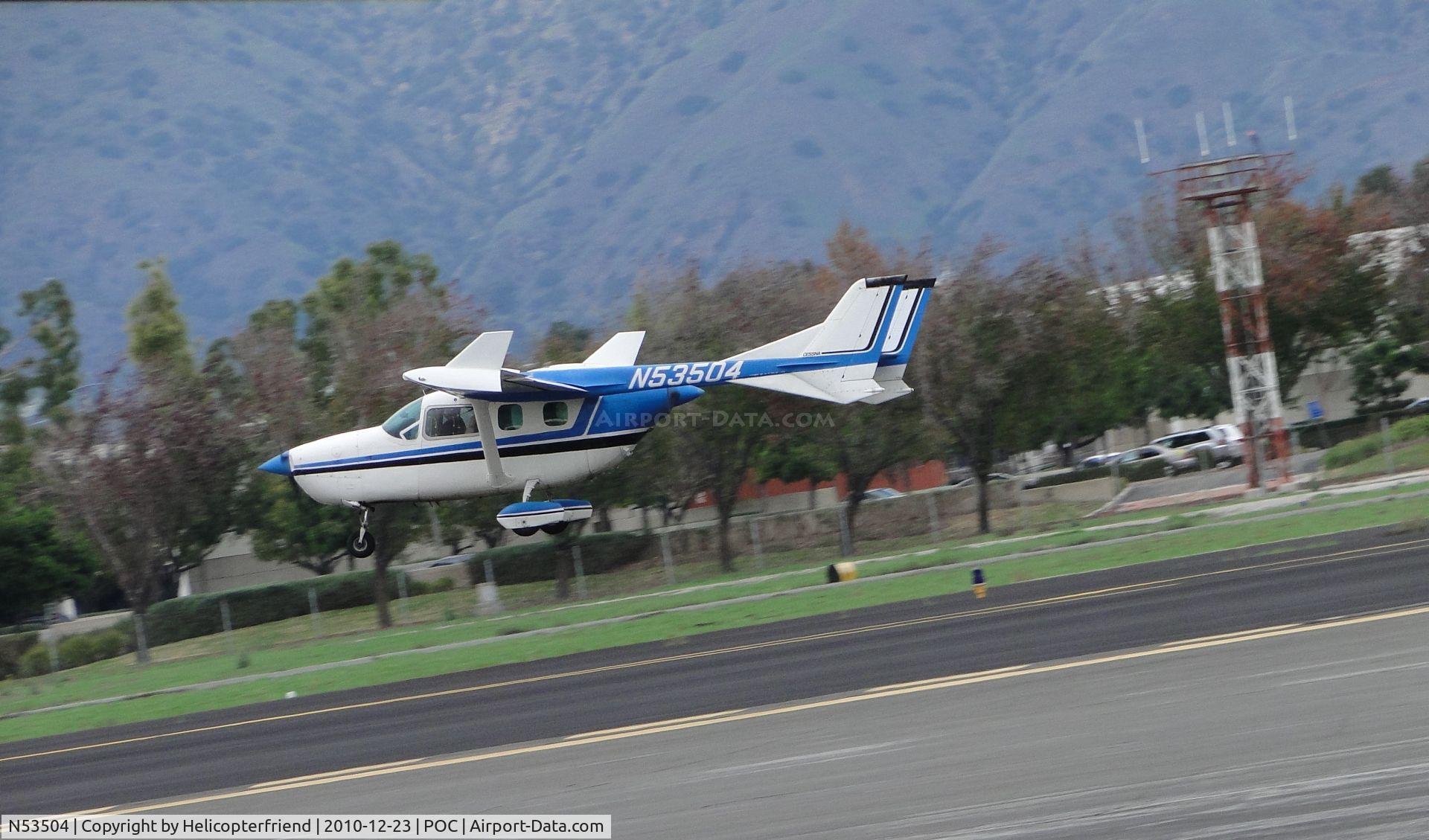 N53504, 1975 Cessna 337G Super Skymaster C/N 33701664, Just got airbourne from runway 26L and engines seem to quiet down and plane landed and rolled out and then taxied back to fuel station