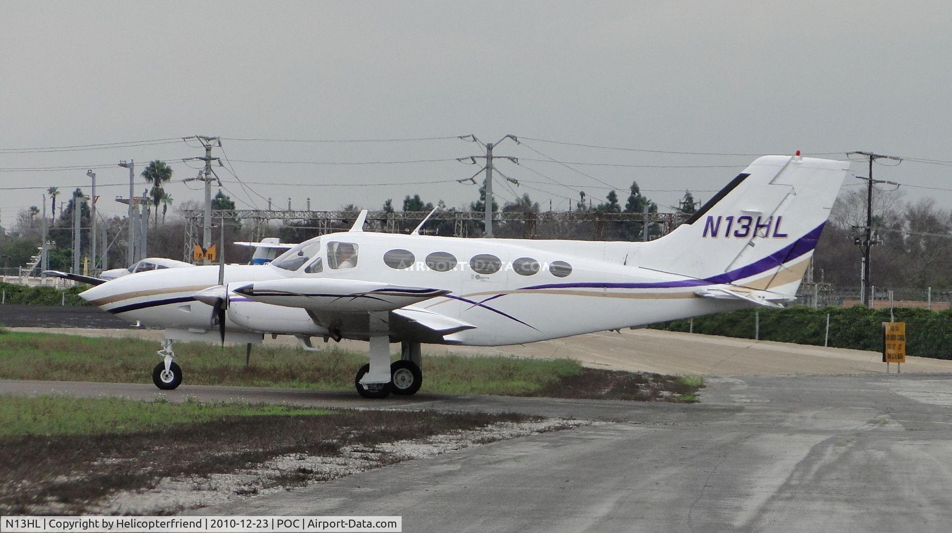 N13HL, 1975 Cessna 421B Golden Eagle C/N 421B0927, Taxiing to runway 26L for take off on a rainy day