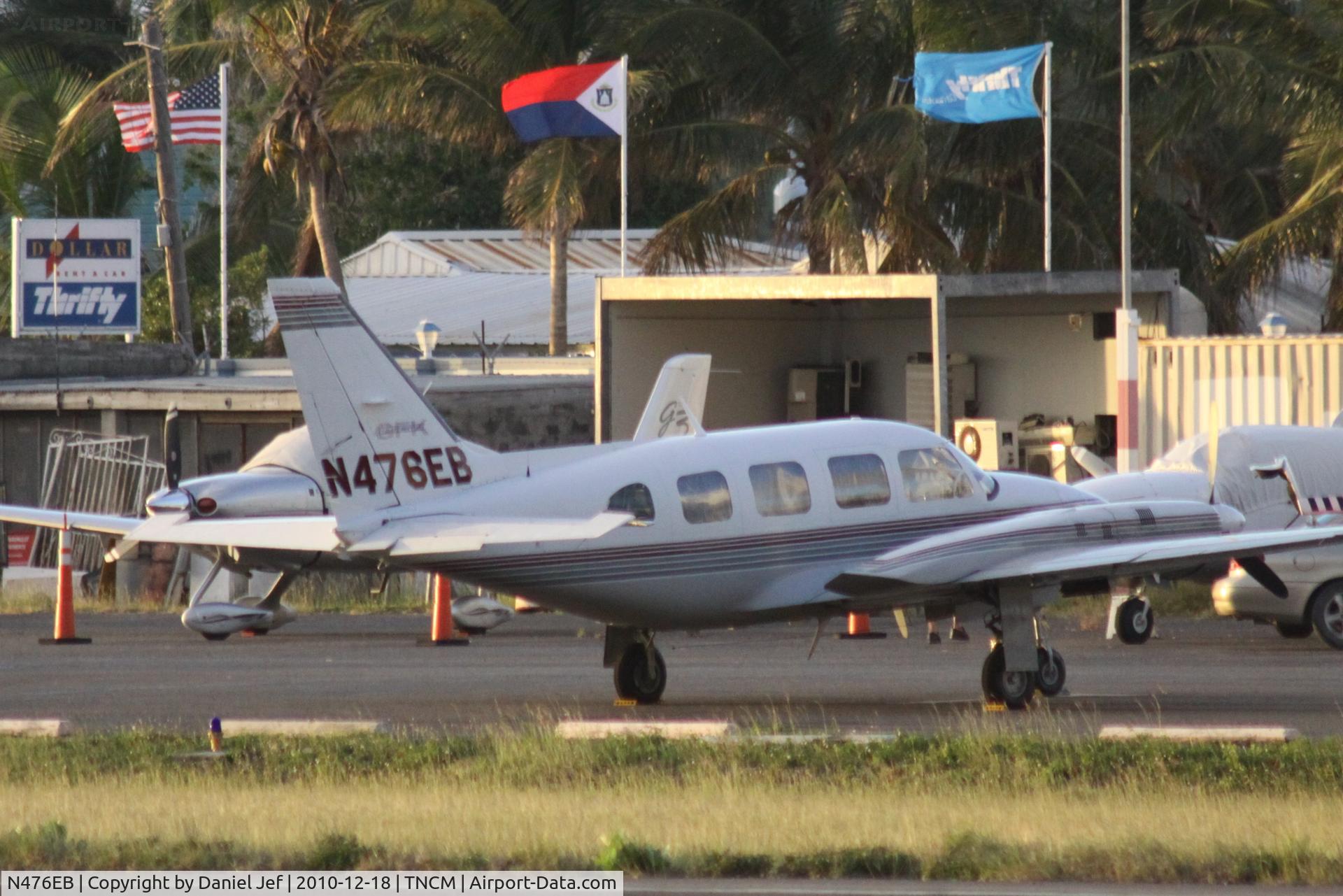 N476EB, 1976 Piper PA-31-325 Navajo C/R C/N 31-7612059, N476EB park on the east ramp at TNCM