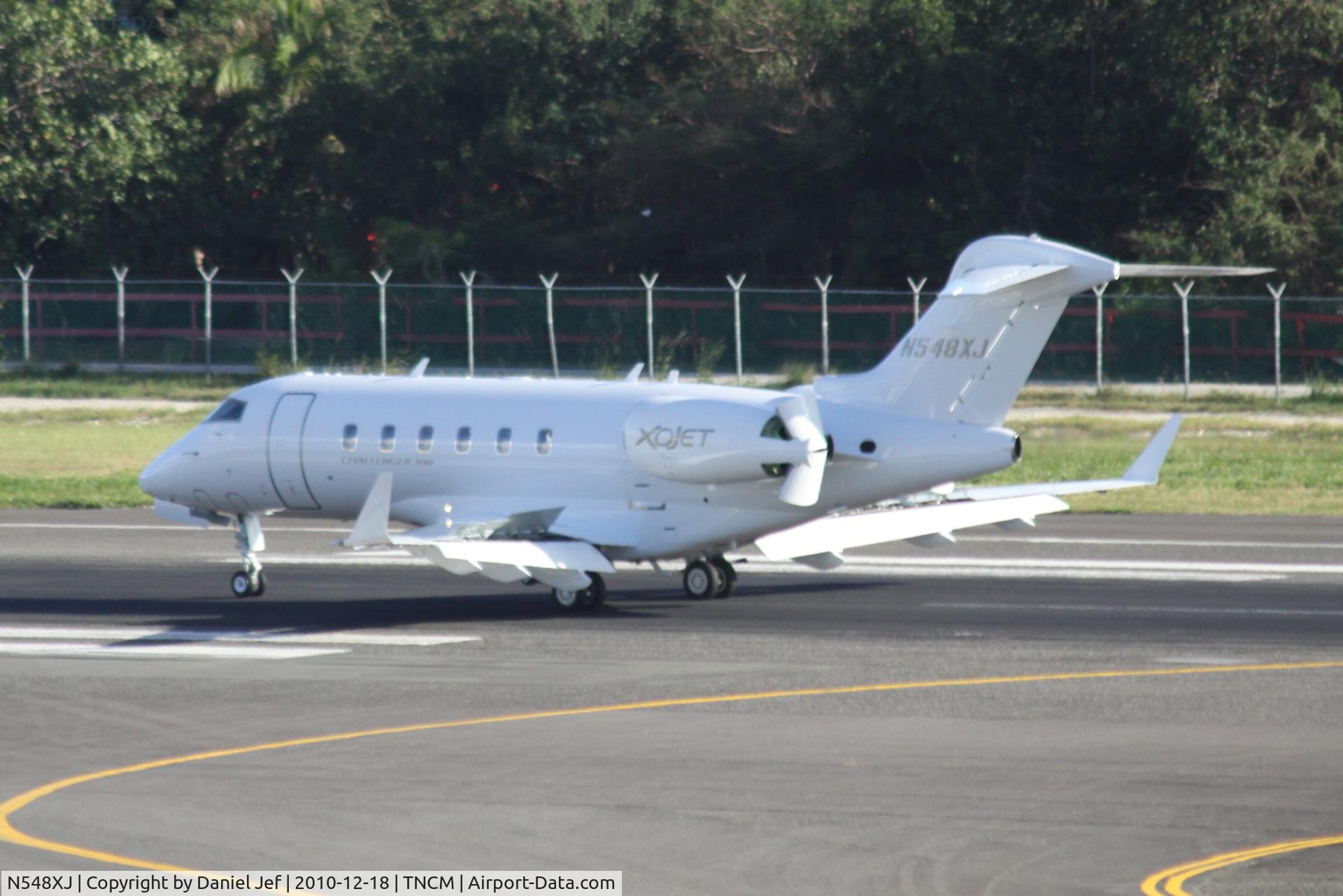 N548XJ, Bombardier Challenger 300 (BD-100-1A10) C/N 20301, N548XJ landing at TNCM
