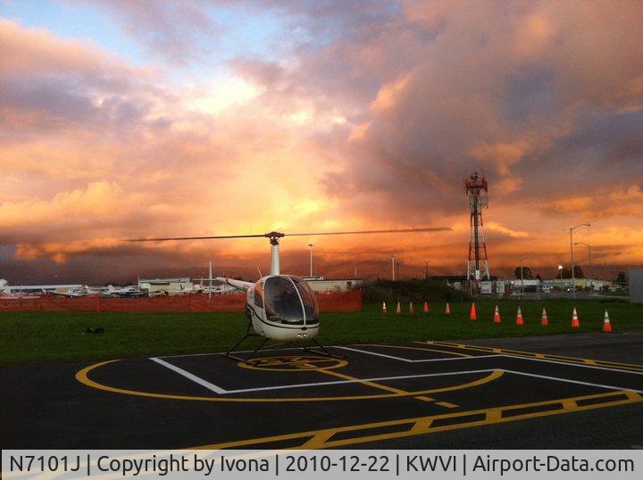 N7101J, 1999 Robinson R22 Beta C/N 3005, N7101J at sunset at the Watsonville Airport (KWVI), Watsonville, CA.  She belongs to Specialized helicopters, a helicopter flight training and tour company.