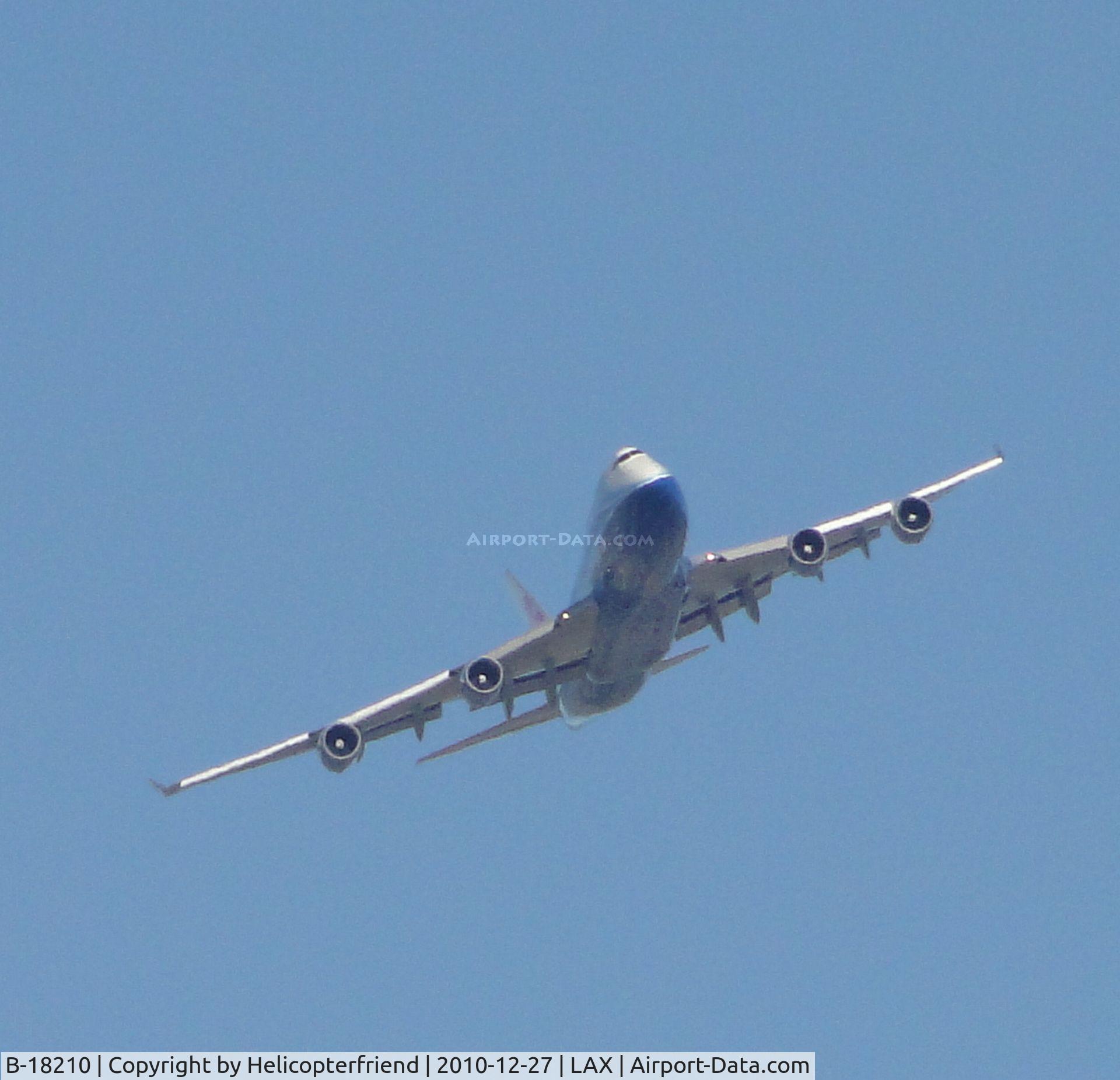 B-18210, 2004 Boeing 747-409 C/N 33734, Turning base from downwind leg east of Bell, California for runway 14