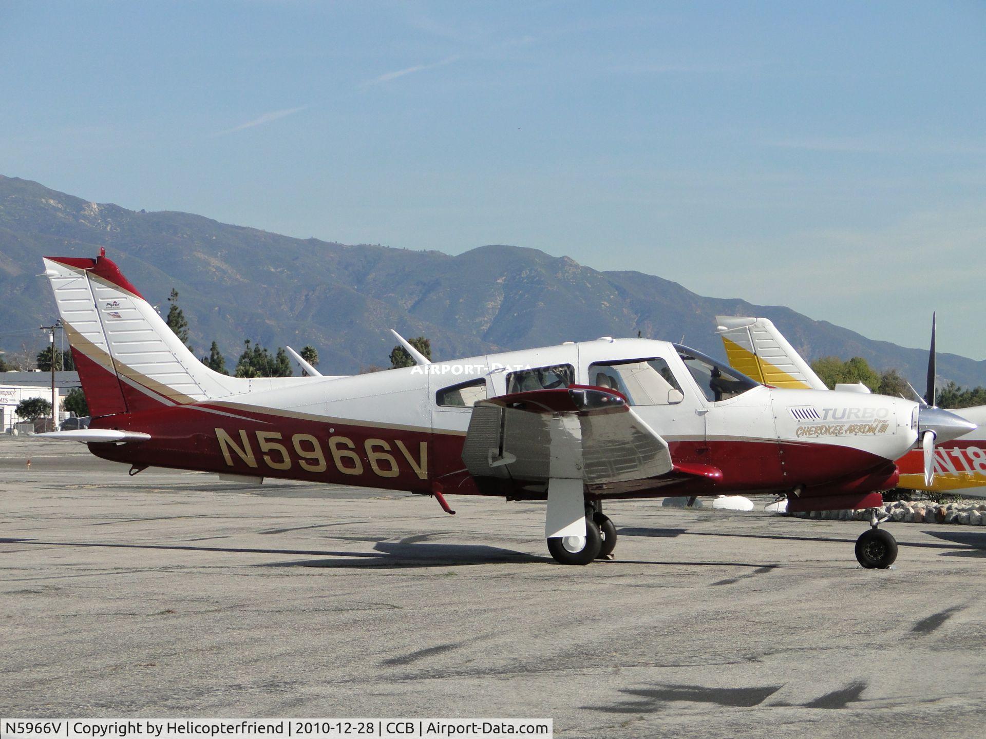 N5966V, 1977 Piper PA-28R-201T Cherokee Arrow III C/N 28R-7703172, Parked north of Maniac Mike's Cafe