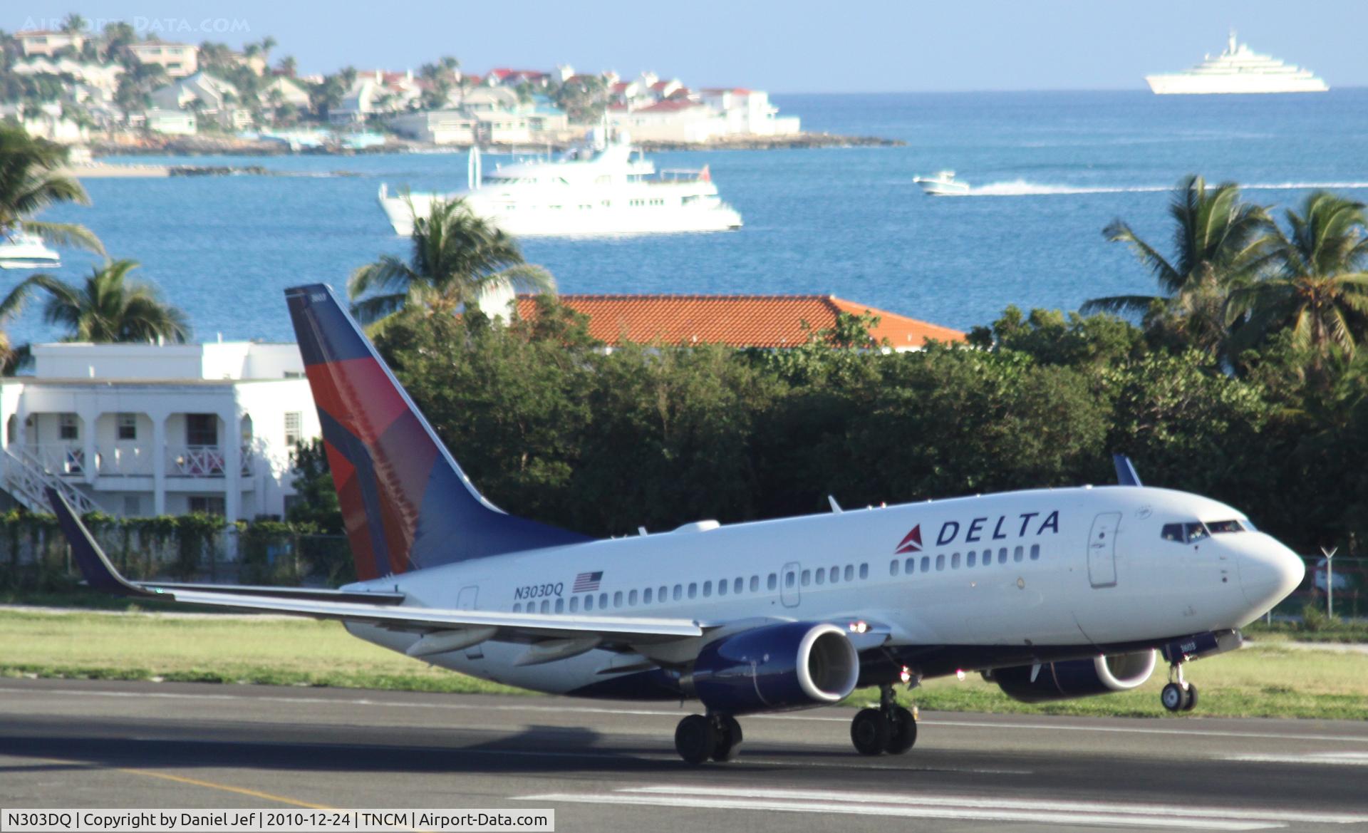 N303DQ, 2008 Boeing 737-732 C/N 29688, Delta airlines N303DQ departing TNCM