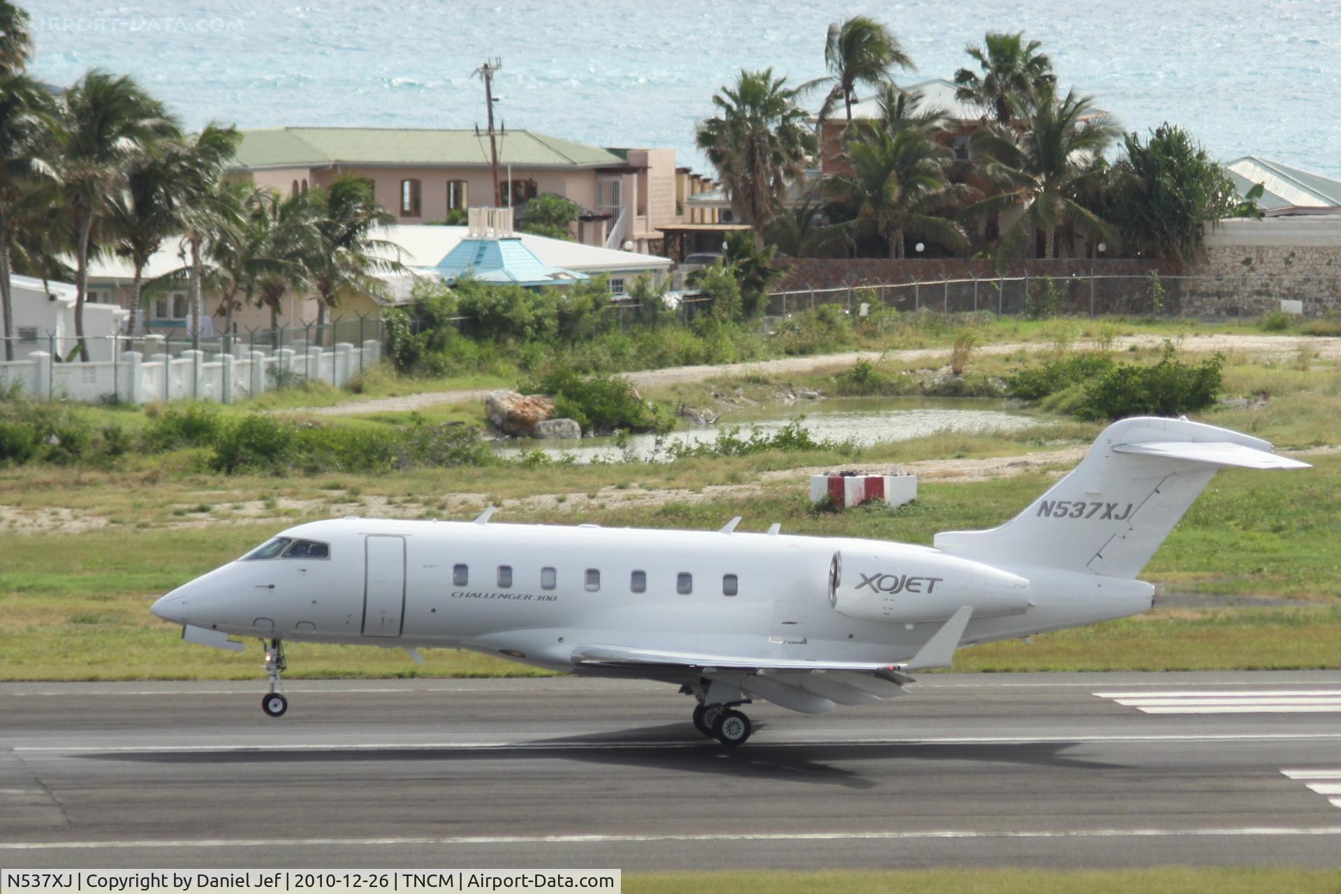 N537XJ, 2008 Bombardier Challenger 300 (BD-100-1A10) C/N 20213, N537XJ landing at TNCM