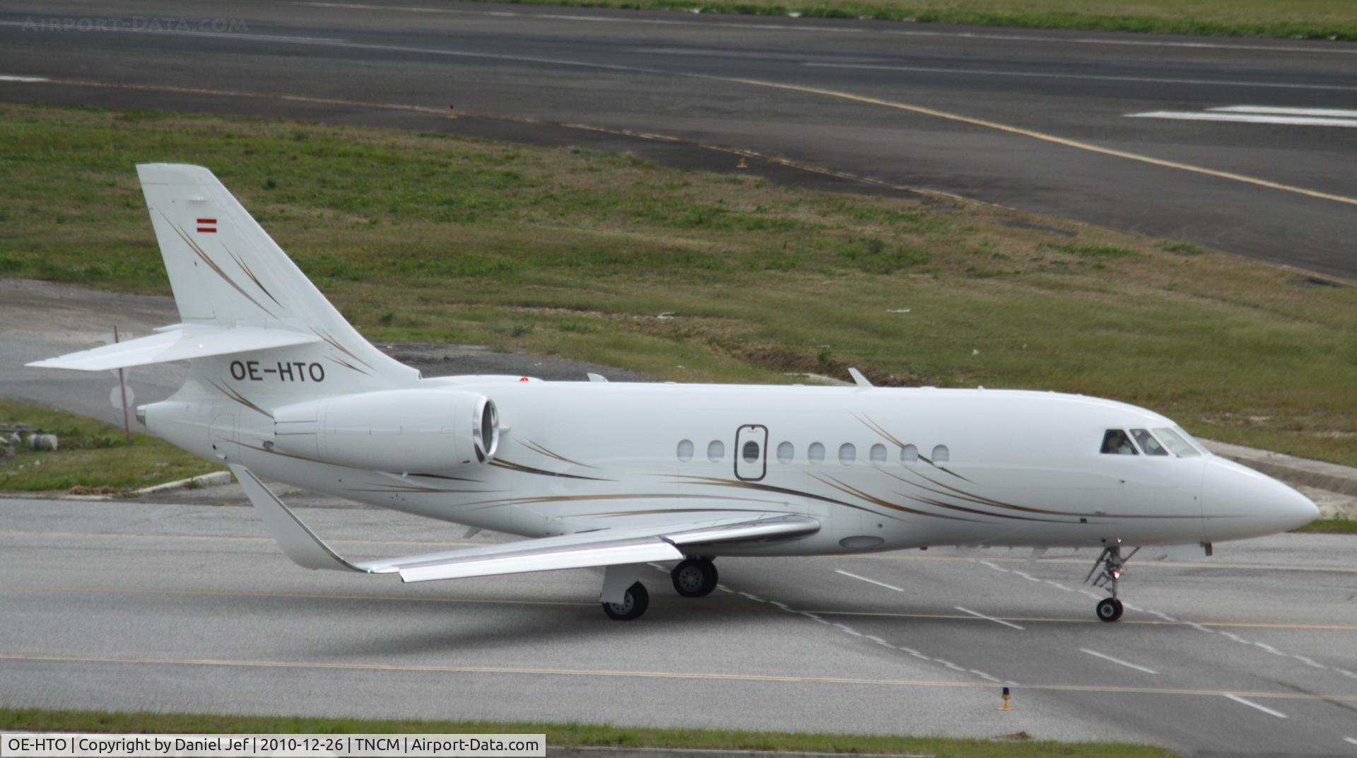 OE-HTO, 2009 Dassault Falcon 2000EX C/N 199, oe-hto taxing to  depart TNCM