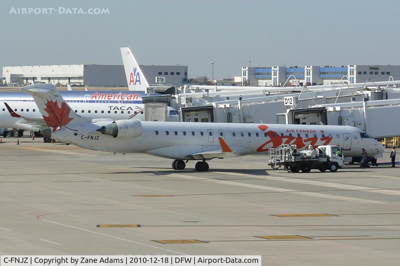 C-FNJZ, 2005 Canadair CRJ-705ER (CL-600-2D15) Regional Jet C/N 15046, Air Canada JAZZ at the gate - DFW Airport