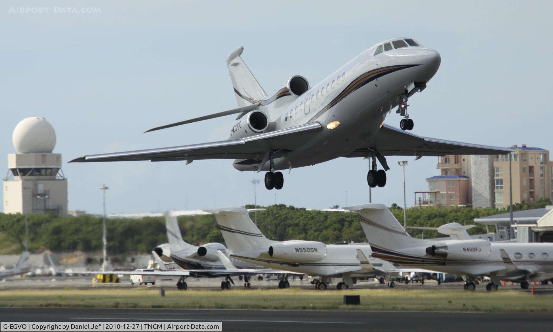 G-EGVO, 2005 Dassault Falcon 900EX C/N 151, G-EGVO departing TNCM