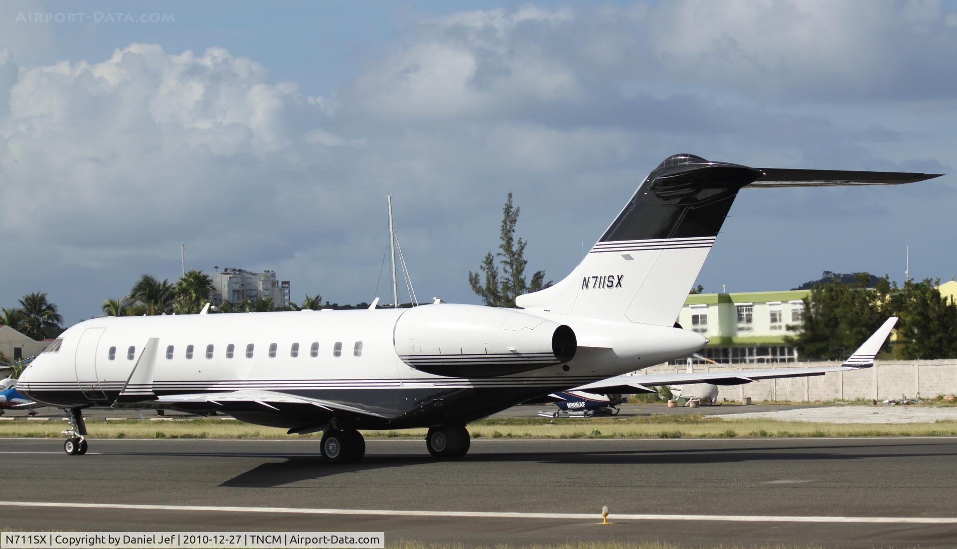 N711SX, 2003 Bombardier BD-700-1A10 Global Express C/N 9125, N711SX back tracking the active at TNCM
