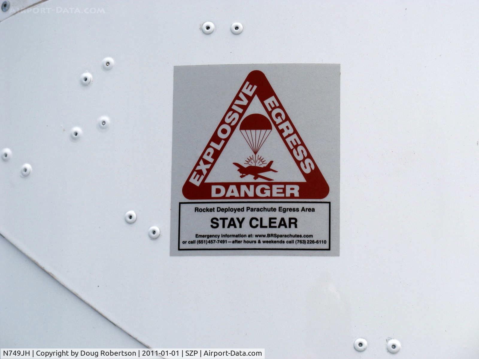 N749JH, 2008 Earthstar Odyssey C/N 61008, 2008 Caston/Caston Earthstar ODYSSEY, HKS 700E 2 cylinder 4 stroke 60 Hp pusher, BRS (Ballistic Recovery Systems) aircraft parachute DANGER warning