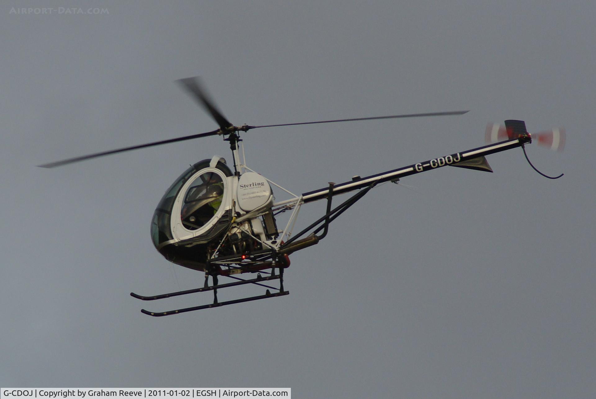 G-CDOJ, 2005 Schweizer 269C-1 C/N 0218, On a training flight.