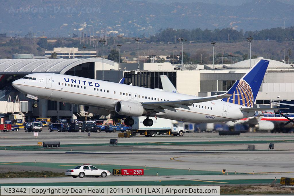 N53442, 2009 Boeing 737-924/ER C/N 33536, United Airlines N53442 (FLT COA556) departing RWY 25R en route to Cleveland-Hopkins Int'l (KCLE). New United titles.