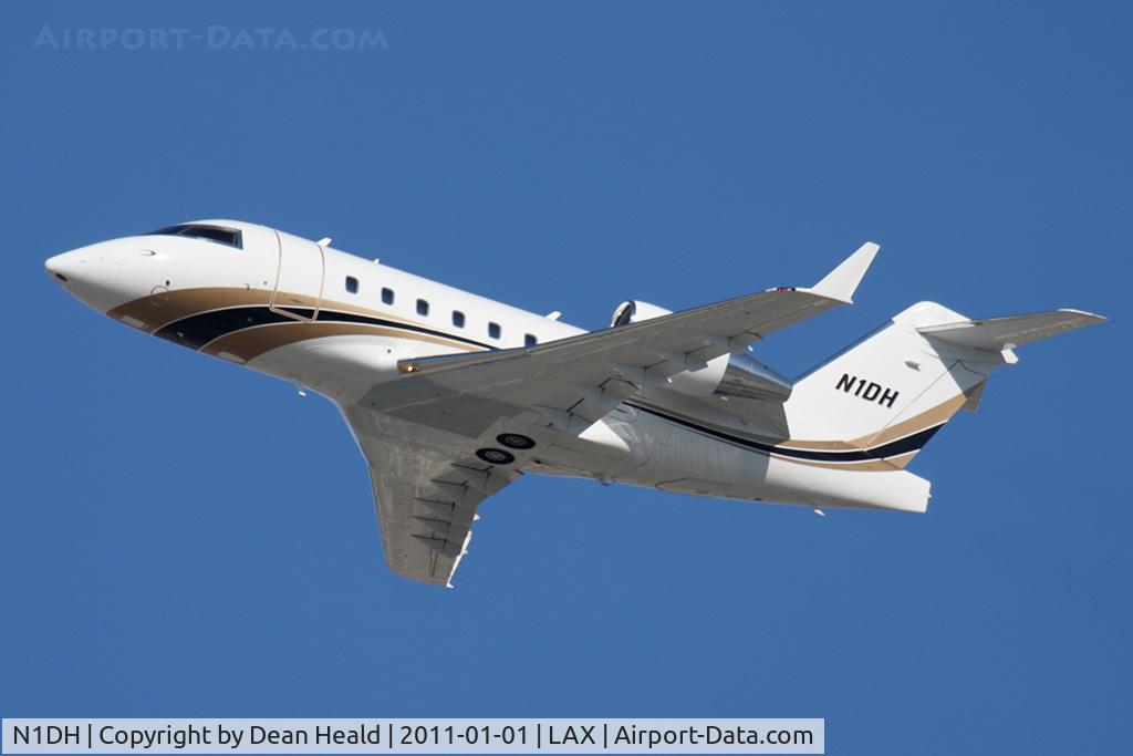 N1DH, 1993 Bombardier Challenger 601-3R (CL-600-2B16) C/N 5145, 1993 Bombardier CL-600-2B16 Challenger N1DH climbing out from RWY 25L en route to Aspen-Pitkin County (KASE).