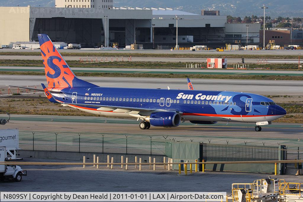 N809SY, 2005 Boeing 737-8Q8 C/N 30683, Sun Country Airlines N809SY (FLT SCX8601) from Chicago O'Hare Intl (KORD) taxiing on Taxiway Alpha to parking.